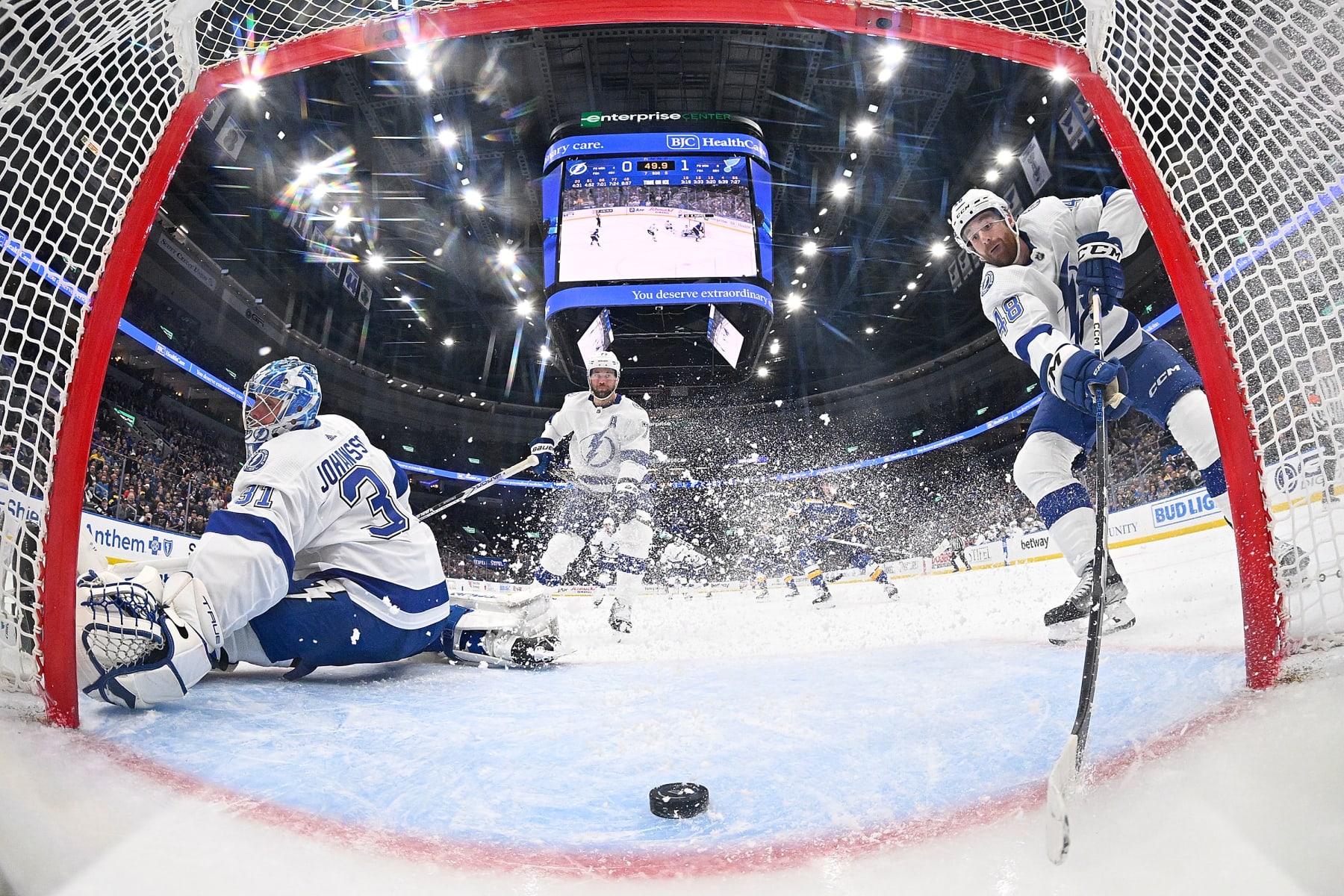 ST. LOUIS, MO - NOVEMBER 14: Nick Perbix #48 of the Tampa Bay Lightning keeps the puck out of the net after a Jonas Johansson #31 of the Tampa Bay Lightning save against the St. Louis Blues on November 14, 2023 at the Enterprise Center in St. Louis, Missouri. (Photo by Scott Rovak/NHLI via Getty Images)