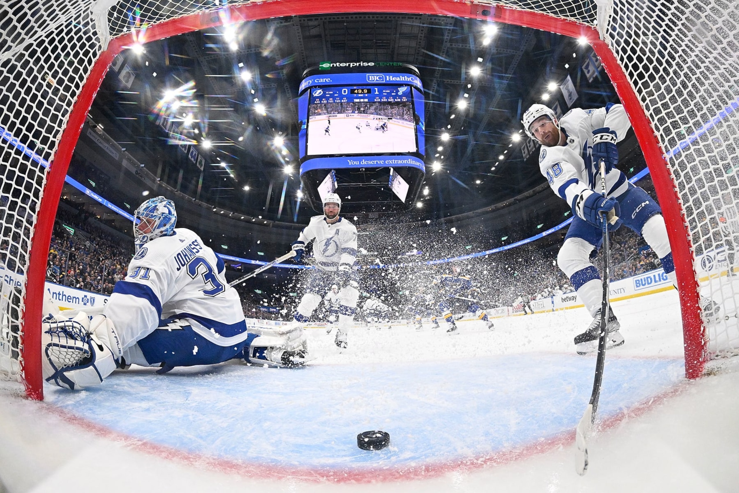 ST. LOUIS, MO - NOVEMBER 14: Nick Perbix #48 of the Tampa Bay Lightning keeps the puck out of the net after a Jonas Johansson #31 of the Tampa Bay Lightning save against the St. Louis Blues on November 14, 2023 at the Enterprise Center in St. Louis, Missouri. (Photo by Scott Rovak/NHLI via Getty Images) ST. LOUIS, MO - NOVEMBER 14: Nick Perbix #48 of the Tampa Bay Lightning keeps the puck out of the net after a Jonas Johansson #31 of the Tampa Bay Lightning save against the St. Louis Blues on November 14, 2023 at the Enterprise Center in St. Louis, Missouri. (Photo by Scott Rovak/NHLI via Getty Images)