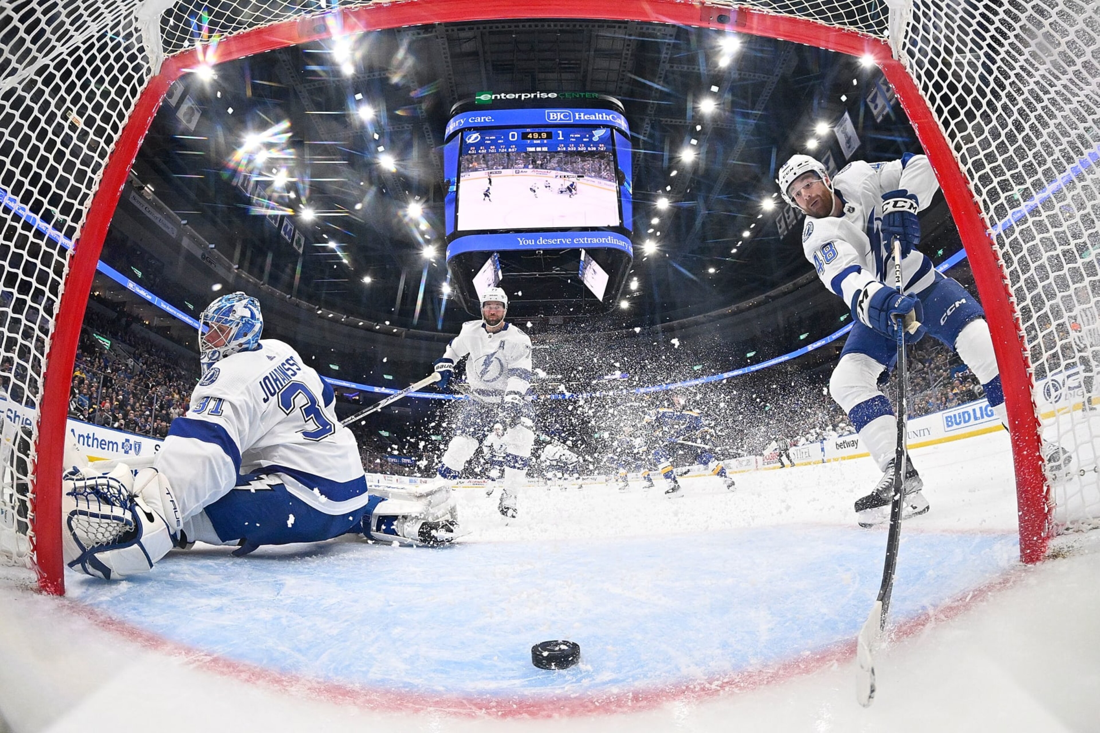 ST. LOUIS, MO - NOVEMBER 14: Nick Perbix #48 of the Tampa Bay Lightning keeps the puck out of the net after a Jonas Johansson #31 of the Tampa Bay Lightning save against the St. Louis Blues on November 14, 2023 at the Enterprise Center in St. Louis, Missouri. (Photo by Scott Rovak/NHLI via Getty Images) ST. LOUIS, MO - NOVEMBER 14: Nick Perbix #48 of the Tampa Bay Lightning keeps the puck out of the net after a Jonas Johansson #31 of the Tampa Bay Lightning save against the St. Louis Blues on November 14, 2023 at the Enterprise Center in St. Louis, Missouri. (Photo by Scott Rovak/NHLI via Getty Images)