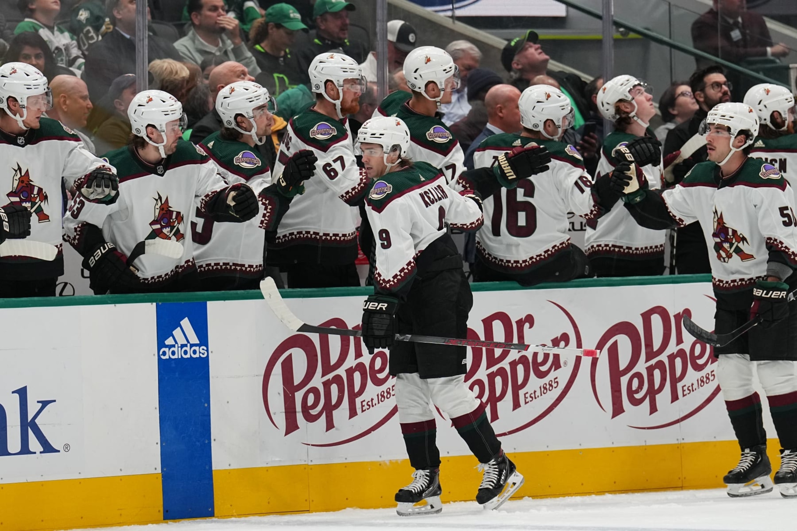 DALLAS, TX - NOVEMBER 14: Clayton Keller #9 and the Arizona Coyotes celebrate a goal against the Dallas Stars at the American Airlines Center on November 14, 2023 in Dallas, Texas. (Photo by Glenn James/NHLI via Getty Images) DALLAS, TX - NOVEMBER 14: Clayton Keller #9 and the Arizona Coyotes celebrate a goal against the Dallas Stars at the American Airlines Center on November 14, 2023 in Dallas, Texas. (Photo by Glenn James/NHLI via Getty Images)