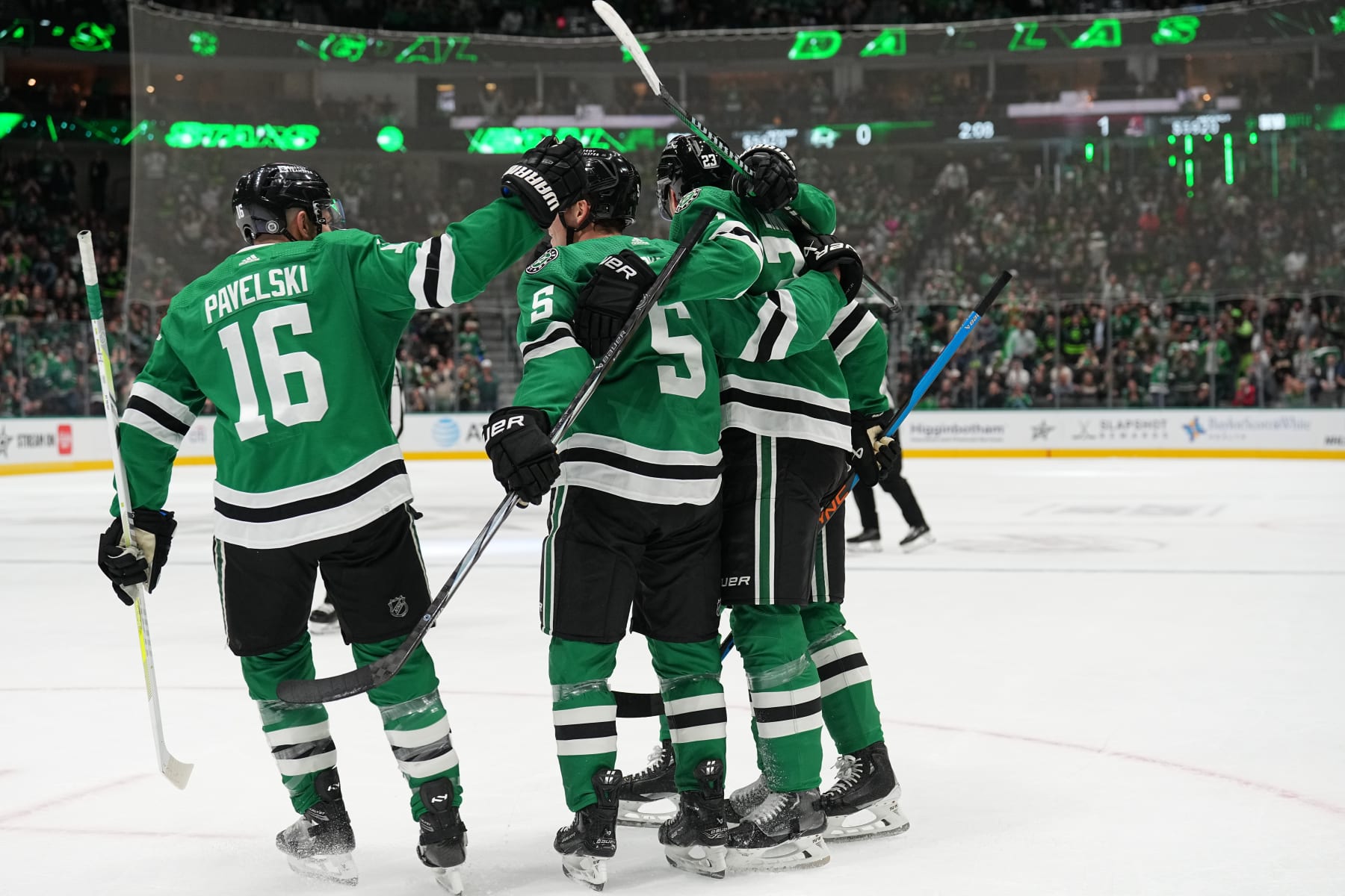 DALLAS, TX - NOVEMBER 14: Esa Lindell #23, Roope Hintz and Nils Lundkvist #5, Joe Pavelski #16 and the Dallas Stars celebrate a goal against the Arizona Coyotes at the American Airlines Center on November 14, 2023 in Dallas, Texas. (Photo by Glenn James/NHLI via Getty Images)