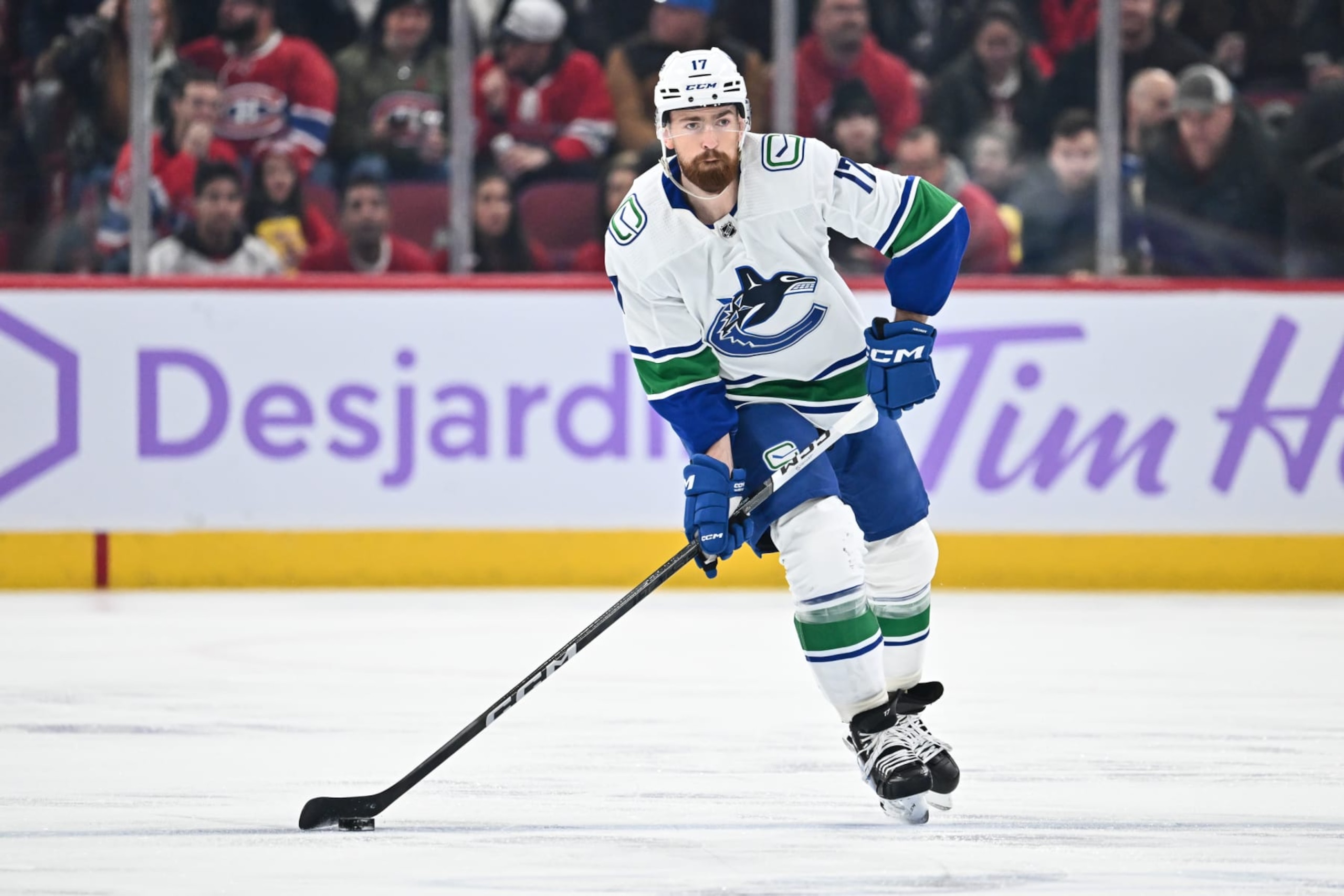 MONTREAL, CANADA - NOVEMBER 12: Filip Hronek #17 of the Vancouver Canucks skates the puck during the first period against the Montreal Canadiens at the Bell Centre on November 12, 2023 in Montreal, Quebec, Canada. The Vancouver Canucks defeated the Montreal Canadiens 5-2. (Photo by Minas Panagiotakis/Getty Images) MONTREAL, CANADA - NOVEMBER 12: Filip Hronek #17 of the Vancouver Canucks skates the puck during the first period against the Montreal Canadiens at the Bell Centre on November 12, 2023 in Montreal, Quebec, Canada. The Vancouver Canucks defeated the Montreal Canadiens 5-2. (Photo by Minas Panagiotakis/Getty Images)