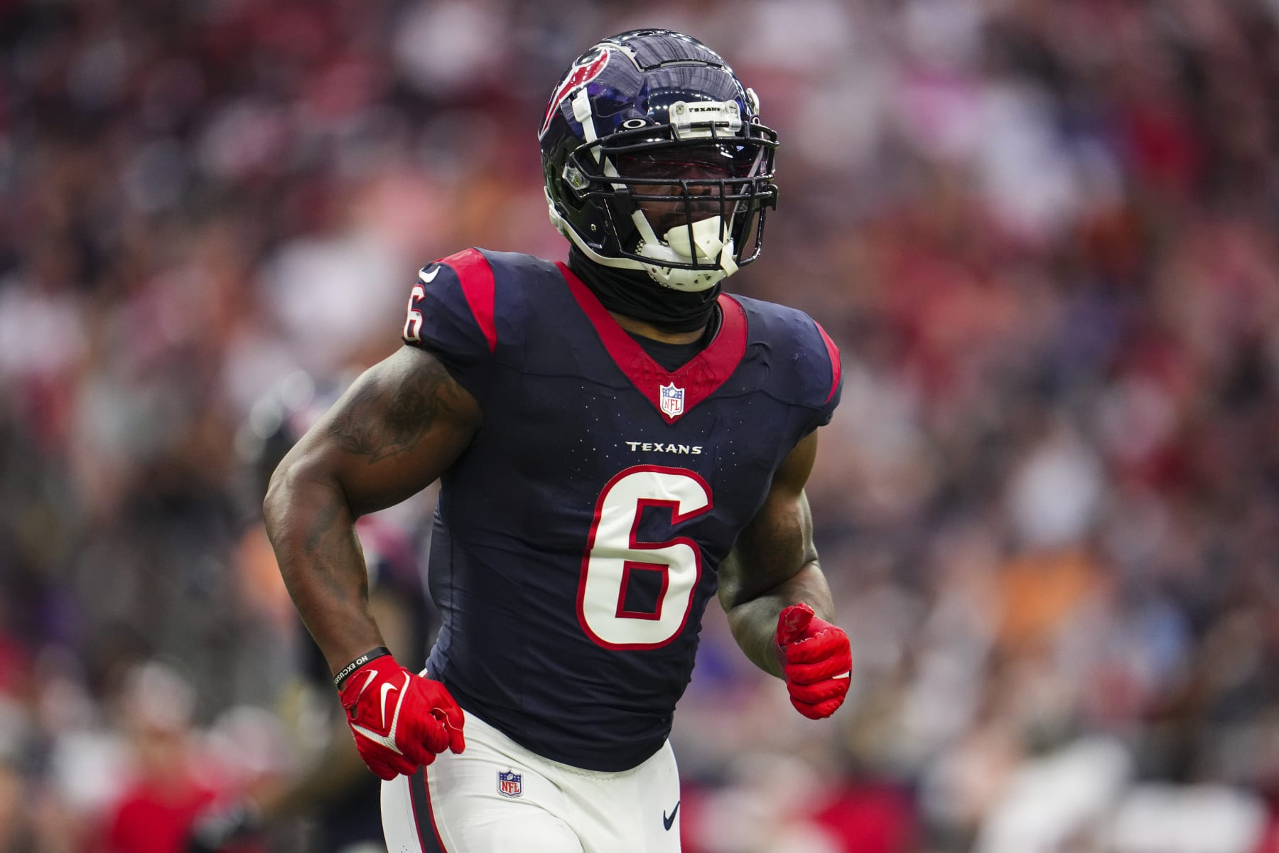 HOUSTON, TX - NOVEMBER 05: Denzel Perryman #6 of the Houston Texans runs across the field during an NFL football game against the Tampa Bay Buccaneers at NRG Stadium on November 5, 2023 in Houston, Texas. (Photo by Cooper Neill/Getty Images)