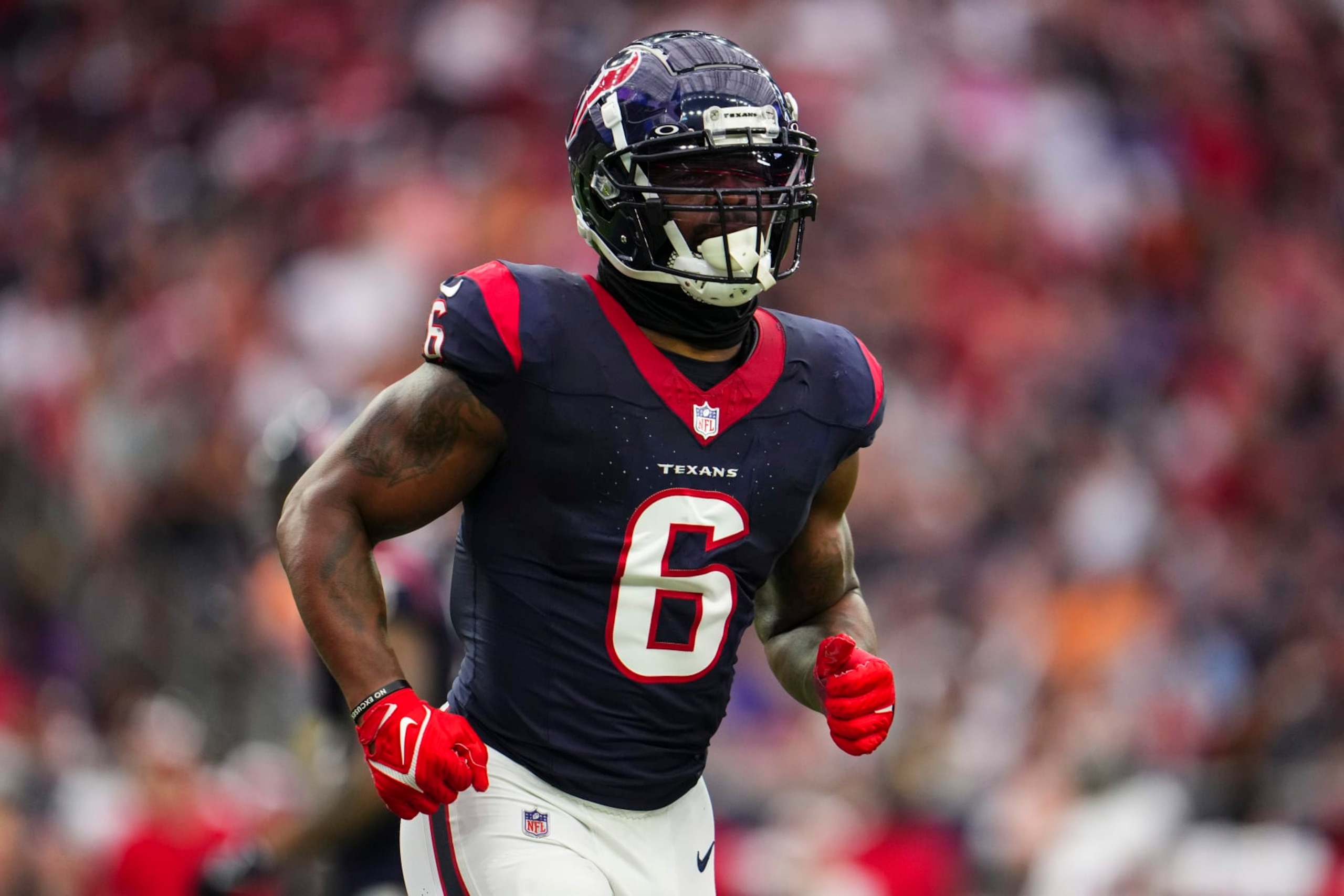 HOUSTON, TX - NOVEMBER 05: Denzel Perryman #6 of the Houston Texans runs across the field during an NFL football game against the Tampa Bay Buccaneers at NRG Stadium on November 5, 2023 in Houston, Texas. (Photo by Cooper Neill/Getty Images)