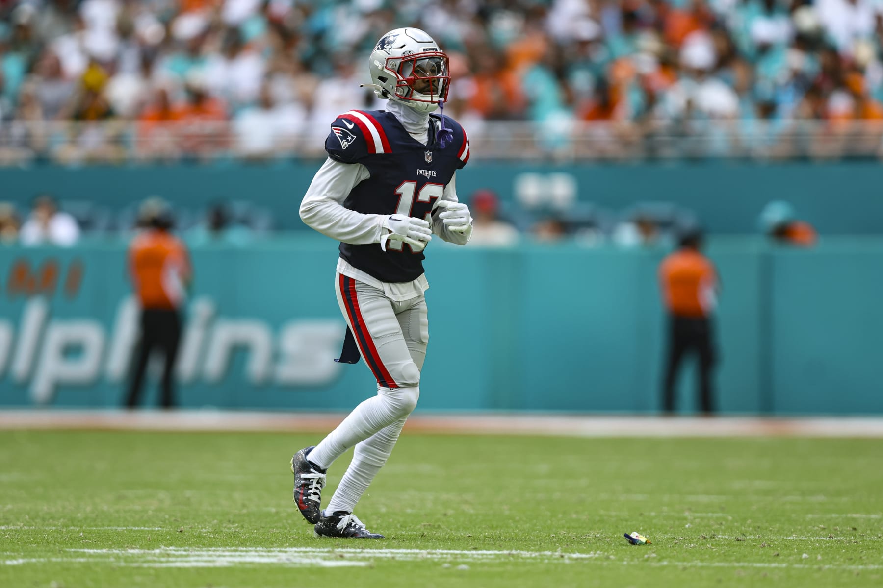 MIAMI GARDENS, FL - OCTOBER 29: Jack Jones #13 of the New England Patriots runs across the field during an NFL football game against the Miami Dolphins at Hard Rock Stadium on October 29, 2023 in Miami Gardens, Florida. (Photo by Perry Knotts/Getty Images)