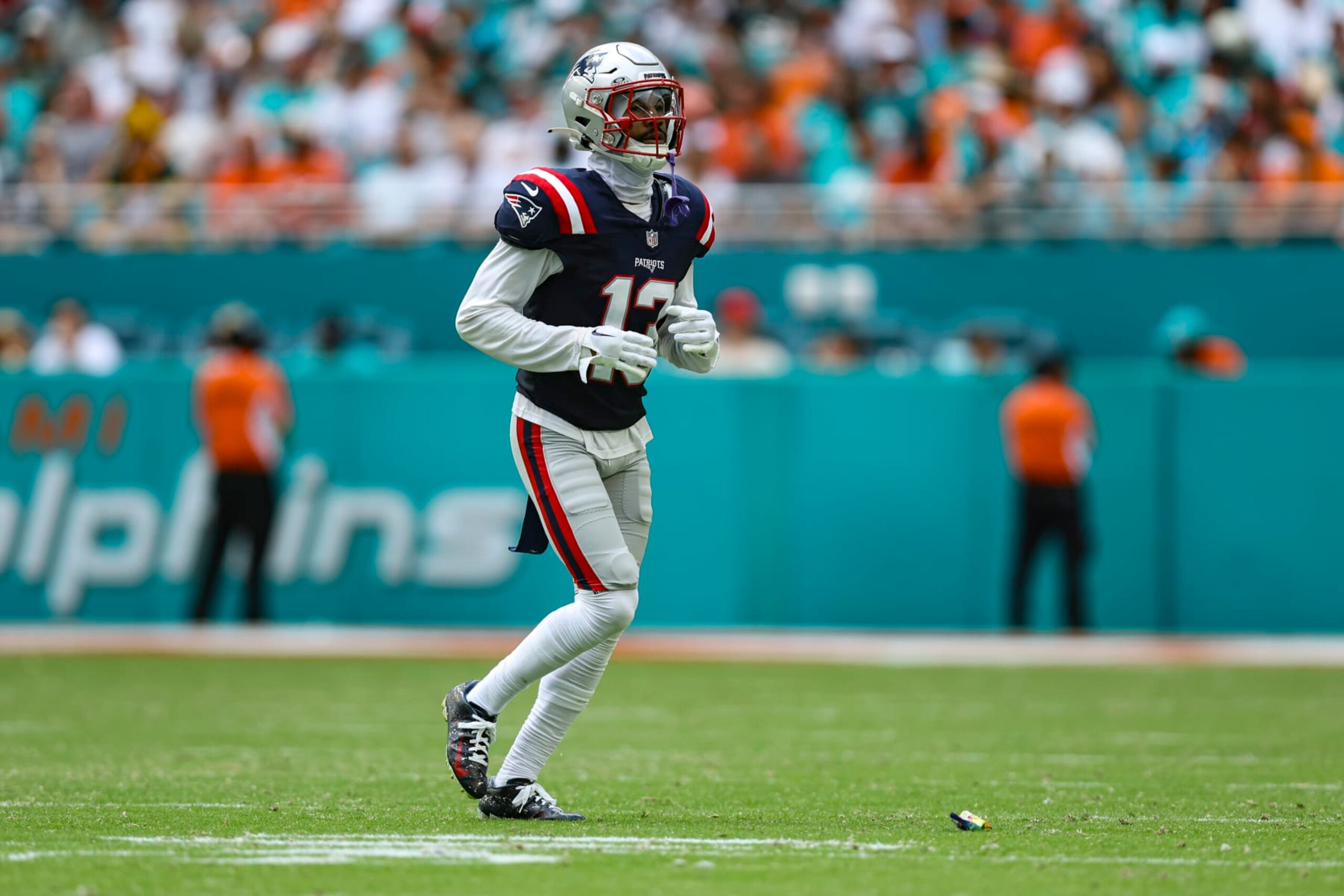 MIAMI GARDENS, FL - OCTOBER 29: Jack Jones #13 of the New England Patriots runs across the field during an NFL football game against the Miami Dolphins at Hard Rock Stadium on October 29, 2023 in Miami Gardens, Florida. (Photo by Perry Knotts/Getty Images)