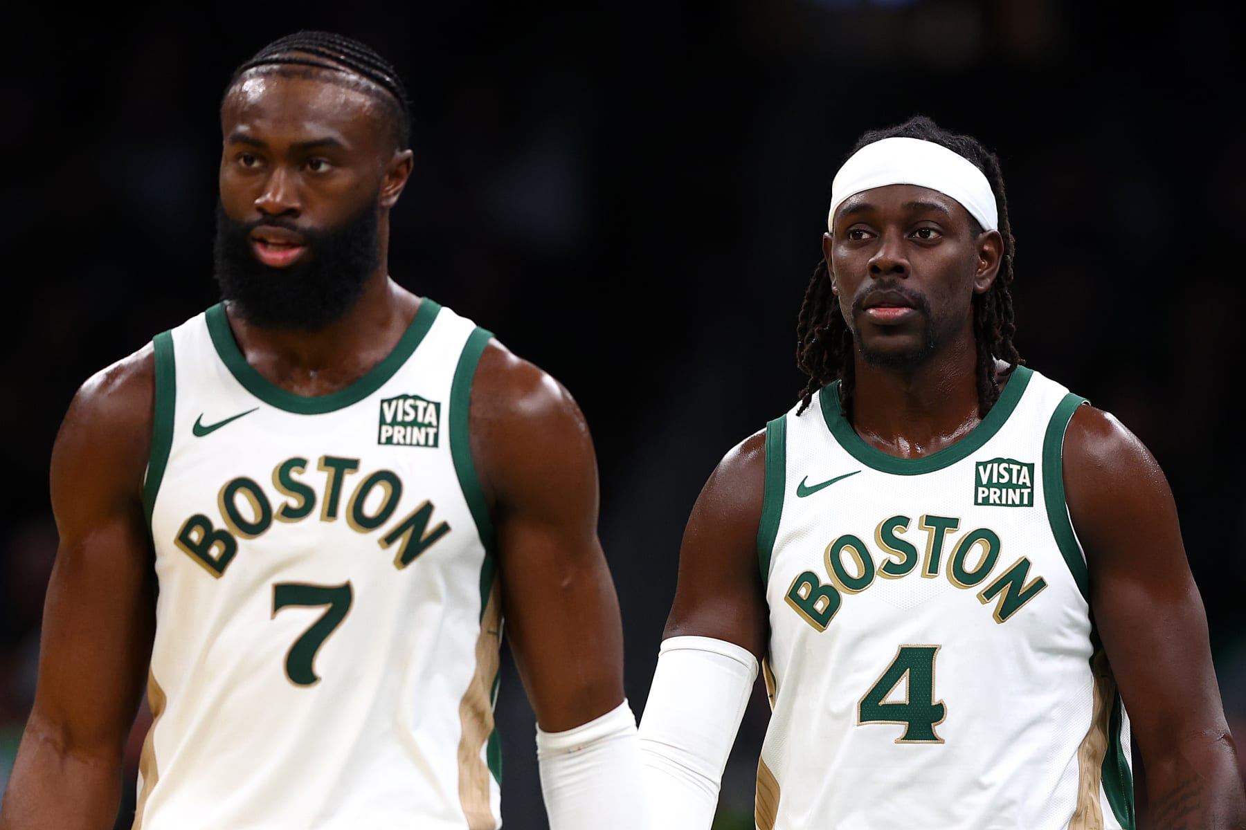 BOSTON, MASSACHUSETTS - NOVEMBER 10: Jrue Holiday #4 of the Boston Celtics and Jaylen Brown #7 look on during the second half of their In-Season Tournament game against the Brooklyn Nets at TD Garden on November 10, 2023 in Boston, Massachusetts. The Celtics defeat the Nets 121-107. NOTE TO USER: User expressly acknowledges and agrees that, by downloading and or using this photograph, User is consenting to the terms and conditions of the Getty Images License Agreement. (Photo by Maddie Meyer/Getty Images)