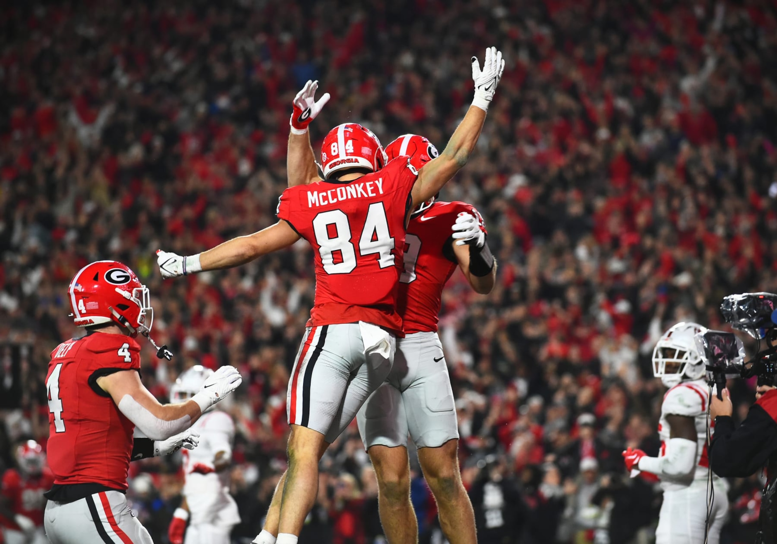 ATHENS, GA - NOVEMBER 11: Georgia Bulldogs Wide Receiver Ladd McConkey (84) and Georgia Bulldogs Tight End Brock Bowers (19) celebrate a touchdown during the college football game between the Ole Miss Rebels and the Georgia Bulldogs on November 11, 2023, at Sanford Stadium in Athens GA. (Photo by Jeffrey Vest/Icon Sportswire via Getty Images)
