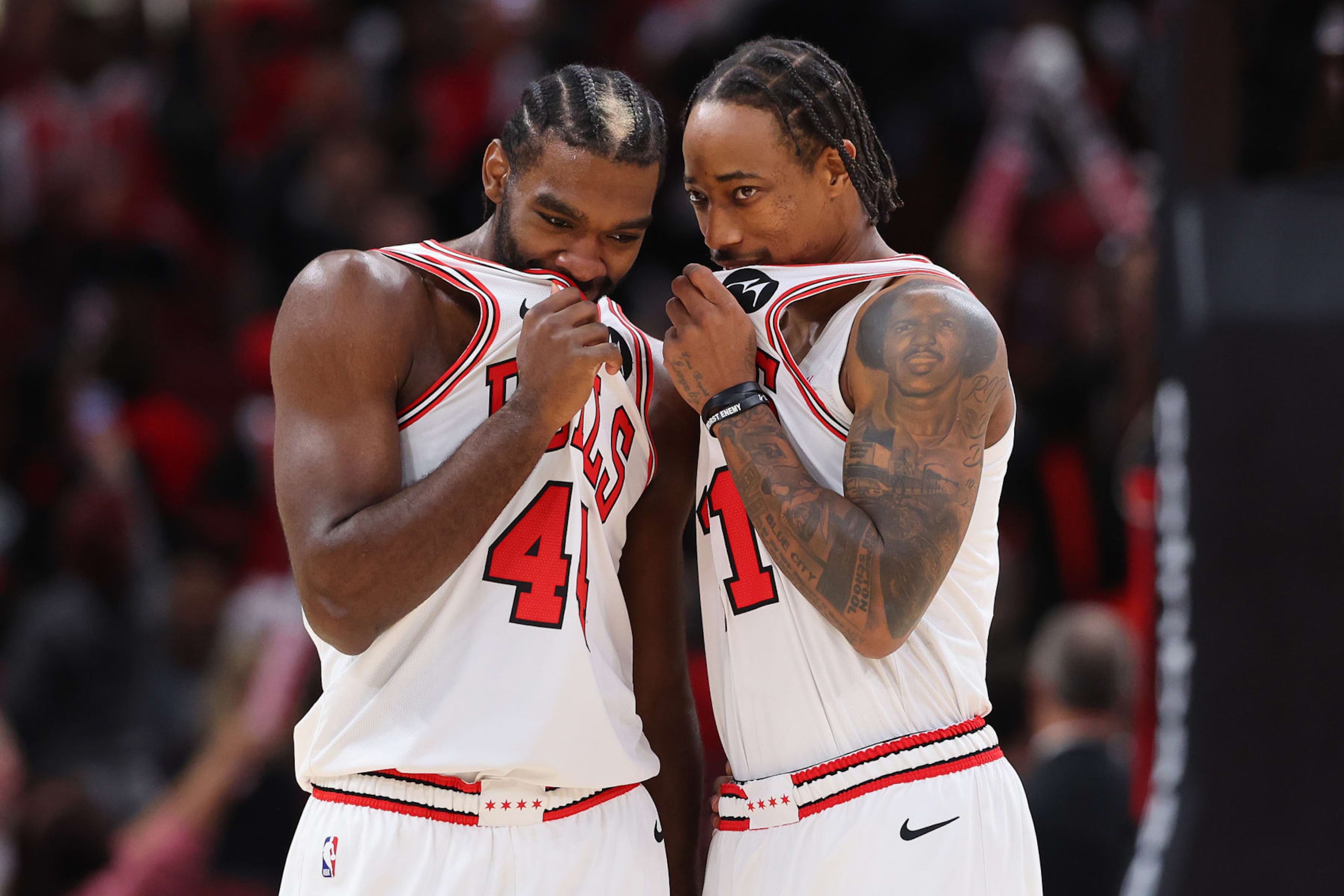 CHICAGO, ILLINOIS - NOVEMBER 06: Patrick Williams #44 and DeMar DeRozan #11 of the Chicago Bulls confer against the Utah Jazz during the first half at the United Center on November 06, 2023 in Chicago, Illinois. NOTE TO USER: User expressly acknowledges and agrees that, by downloading and or using this photograph, User is consenting to the terms and conditions of the Getty Images License Agreement. (Photo by Michael Reaves/Getty Images)