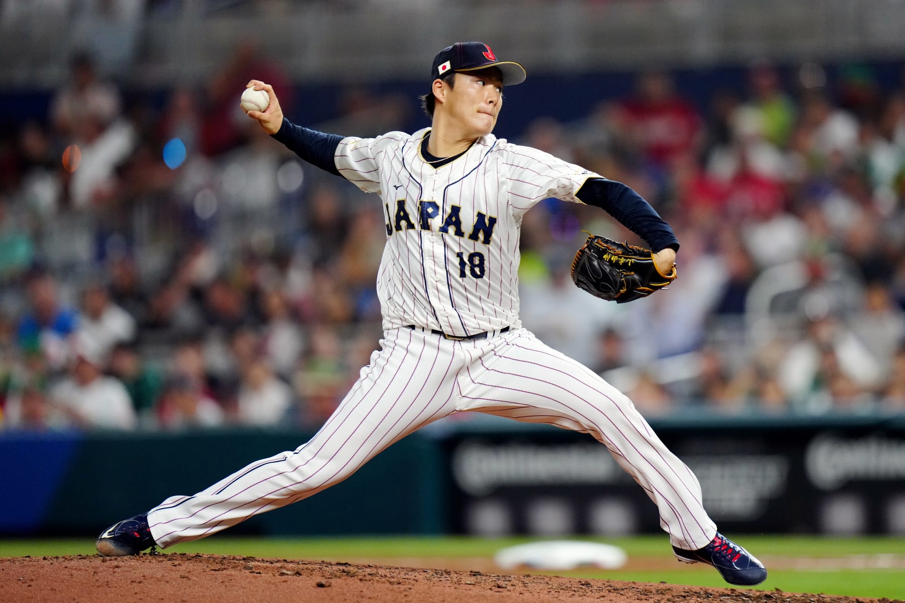 MIAMI, FL - MARCH 20:  Yoshinobu Yamamoto #18 of Team Japan pitches during the 2023 World Baseball Classic Semifinal game between Team Mexico and Team Japan at loanDepot Park on Monday, March 20, 2023 in Miami, Florida. (Photo by Daniel Shirey/WBCI/MLB Photos via Getty Images)