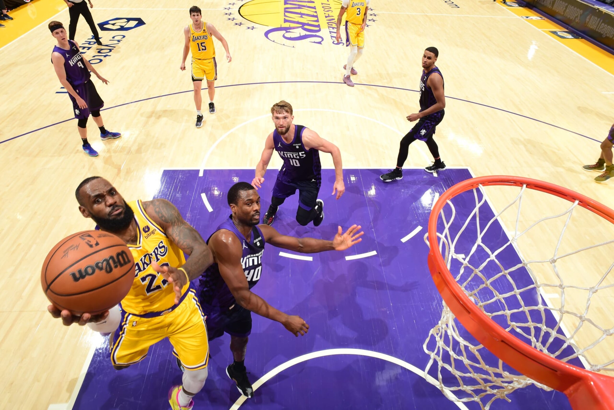 LOS ANGELES, CA - NOVEMBER 15: LeBron James #23 of the Los Angeles Lakers drives to the basket during the game against the Sacramento Kings on November 15, 2023 at Crypto.Com Arena in Los Angeles, California. NOTE TO USER: User expressly acknowledges and agrees that, by downloading and/or using this Photograph, user is consenting to the terms and conditions of the Getty Images License Agreement. Mandatory Copyright Notice: Copyright 2023 NBAE (Photo by Adam Pantozzi/NBAE via Getty Images)