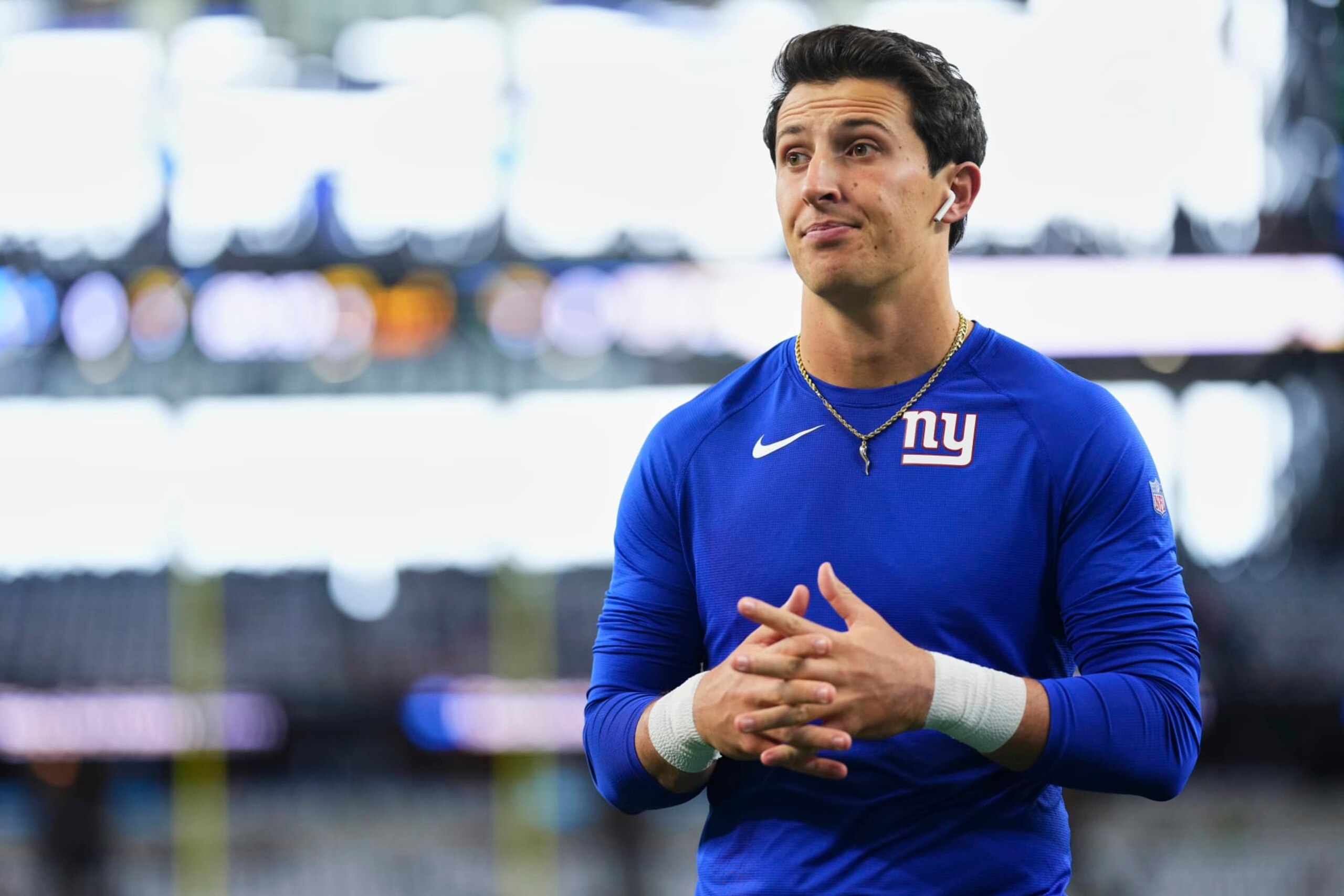 ARLINGTON, TX - NOVEMBER 12: Tommy DeVito #15 of the New York Giants warms up before kickoff against the Dallas Cowboys at AT&T Stadium on November 12, 2023 in Arlington, Texas. (Photo by Cooper Neill/Getty Images)