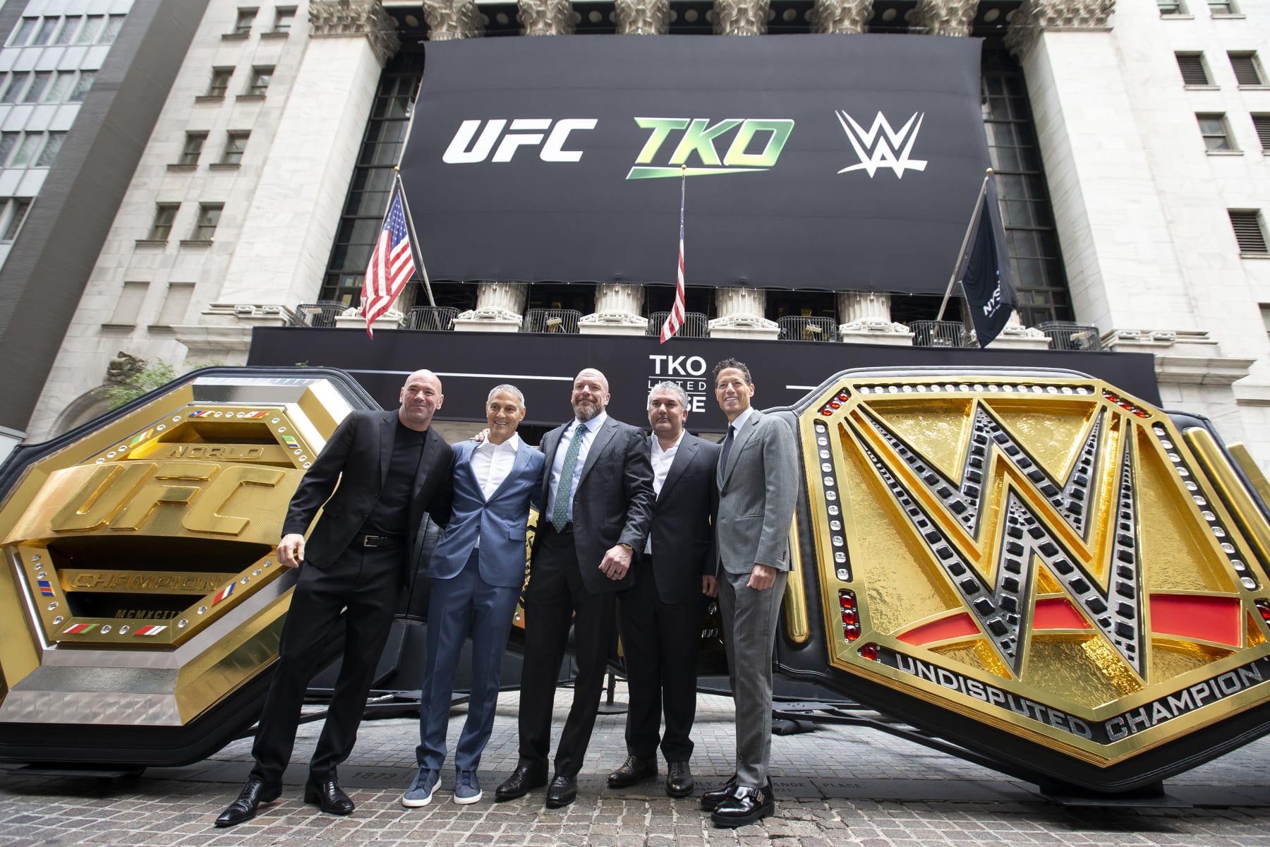 NEW YORK, NEW YORK - SEPTEMBER 12: (L-R) UFC CEO Dana White, TKO + Endeavor CEO Ariel Emanuel, WWE Chief Content Officer Paul Levesque, WWE President Nick Khan, and TKO + Endeavor President and COO Mark Shapiro pose outside the New York Stock Exchange during the TKO Group Holdings' listing day on September 12, 2023 in New York City. (Photo by Michelle Farsi/Zuffa LLC)