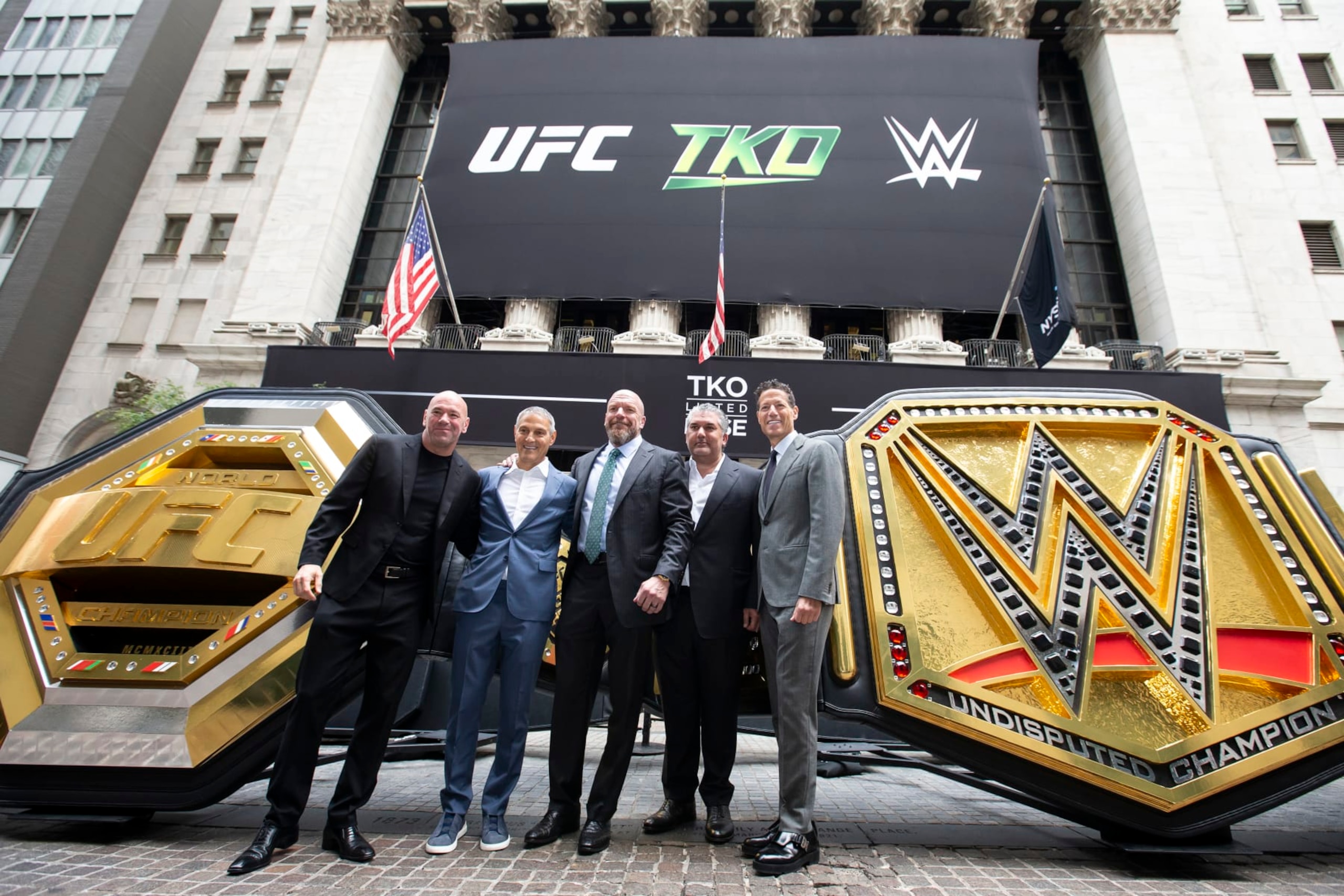 NEW YORK, NEW YORK - SEPTEMBER 12: (L-R) UFC CEO Dana White, TKO + Endeavor CEO Ariel Emanuel, WWE Chief Content Officer Paul Levesque, WWE President Nick Khan, and TKO + Endeavor President and COO Mark Shapiro pose outside the New York Stock Exchange during the TKO Group Holdings' listing day on September 12, 2023 in New York City. (Photo by Michelle Farsi/Zuffa LLC)
