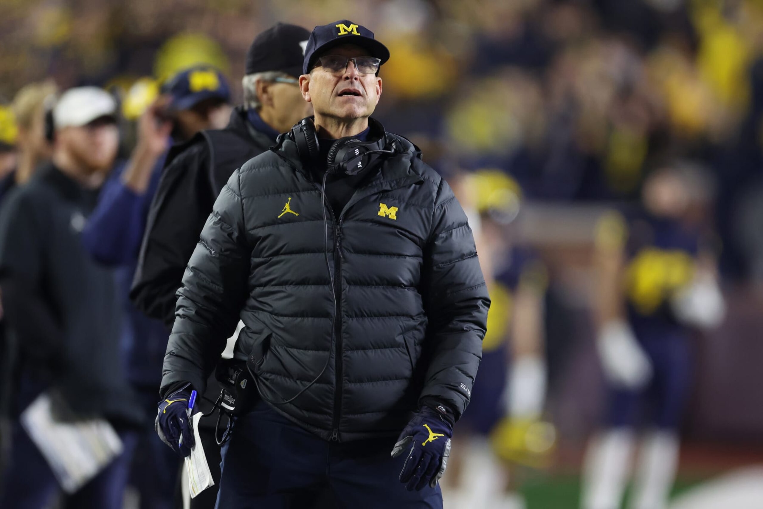 ANN ARBOR, MICHIGAN - NOVEMBER 04: Head coach Jim Harbaugh of the Michigan Wolverines looks on in the first half while playing the Purdue Boilermakers at Michigan Stadium on November 04, 2023 in Ann Arbor, Michigan. (Photo by Gregory Shamus/Getty Images)