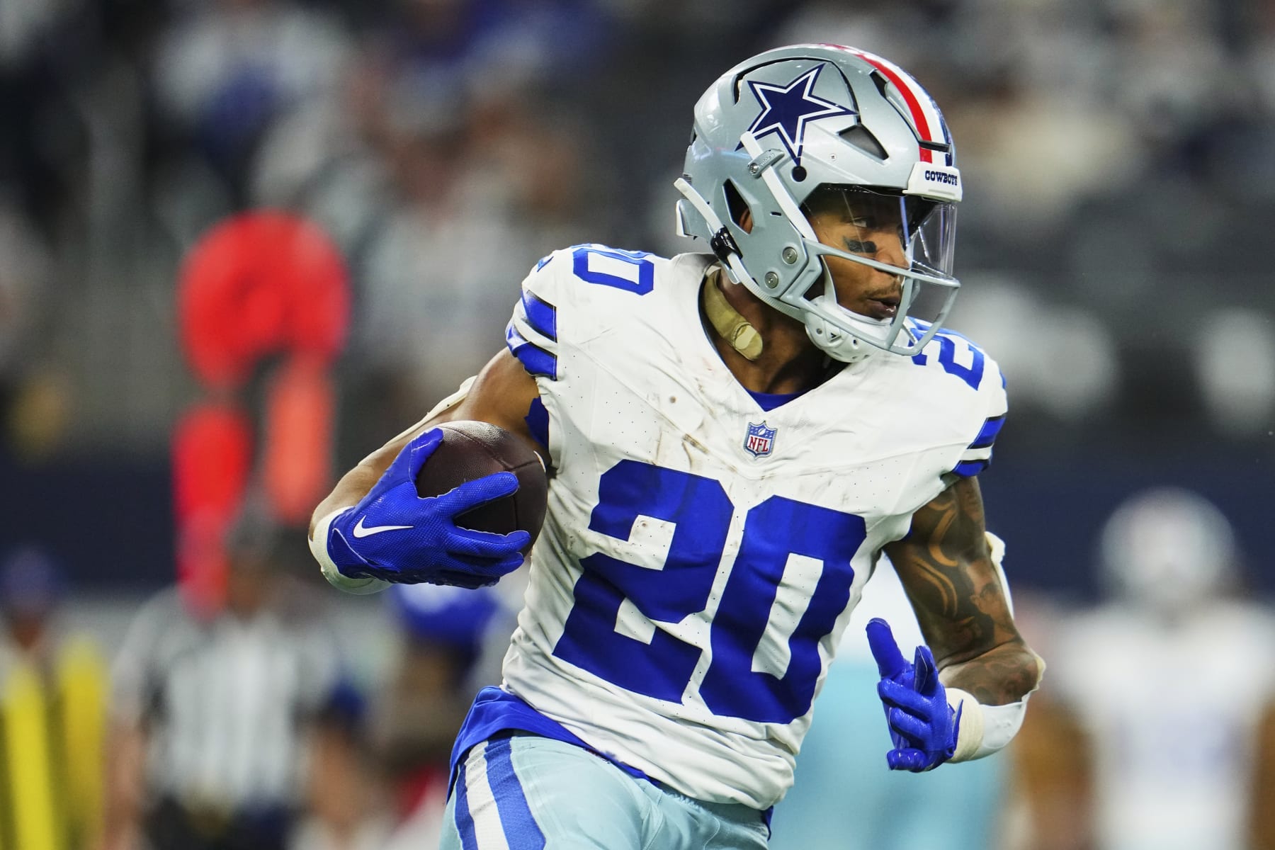 ARLINGTON, TX - NOVEMBER 12: Tony Pollard #20 of the Dallas Cowboys carries the ball against the New York Giants during the second half at AT&T Stadium on November 12, 2023 in Arlington, Texas. (Photo by Cooper Neill/Getty Images)
