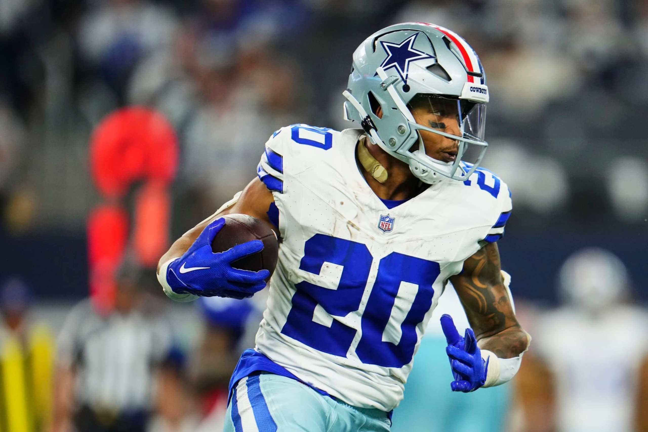 ARLINGTON, TX - NOVEMBER 12: Tony Pollard #20 of the Dallas Cowboys carries the ball against the New York Giants during the second half at AT&T Stadium on November 12, 2023 in Arlington, Texas. (Photo by Cooper Neill/Getty Images)