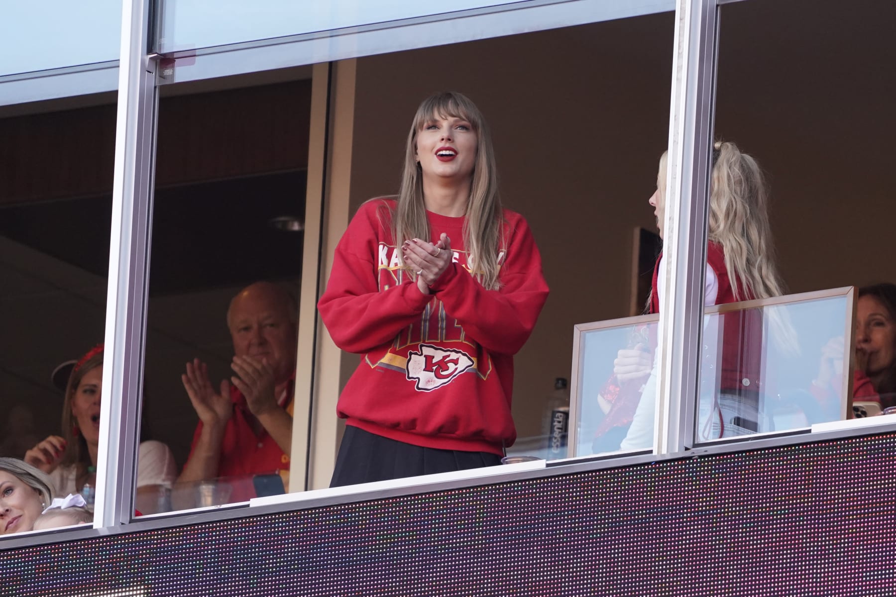 Taylor Swift watches an NFL football game between the Los Angeles Chargers and against the Kansas City Chiefs Sunday, Oct. 22, 2023 in Kansas City, Mo. (AP Photo/Ed Zurga)