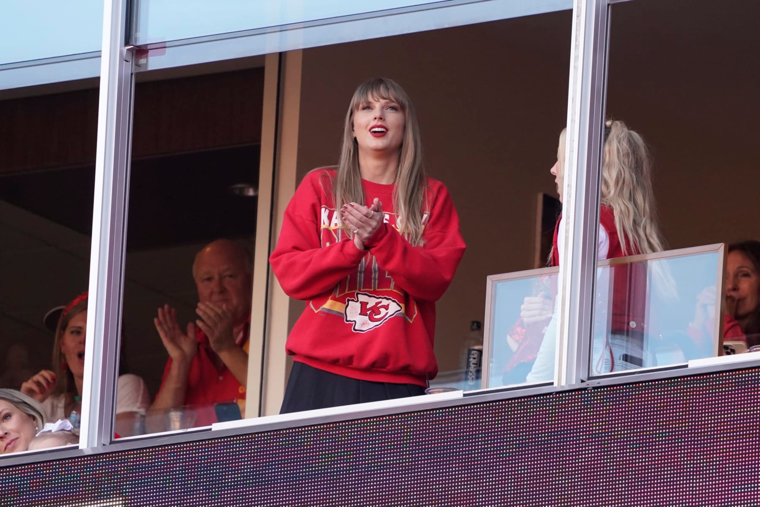 Taylor Swift watches an NFL football game between the Los Angeles Chargers and against the Kansas City Chiefs Sunday, Oct. 22, 2023 in Kansas City, Mo. (AP Photo/Ed Zurga)