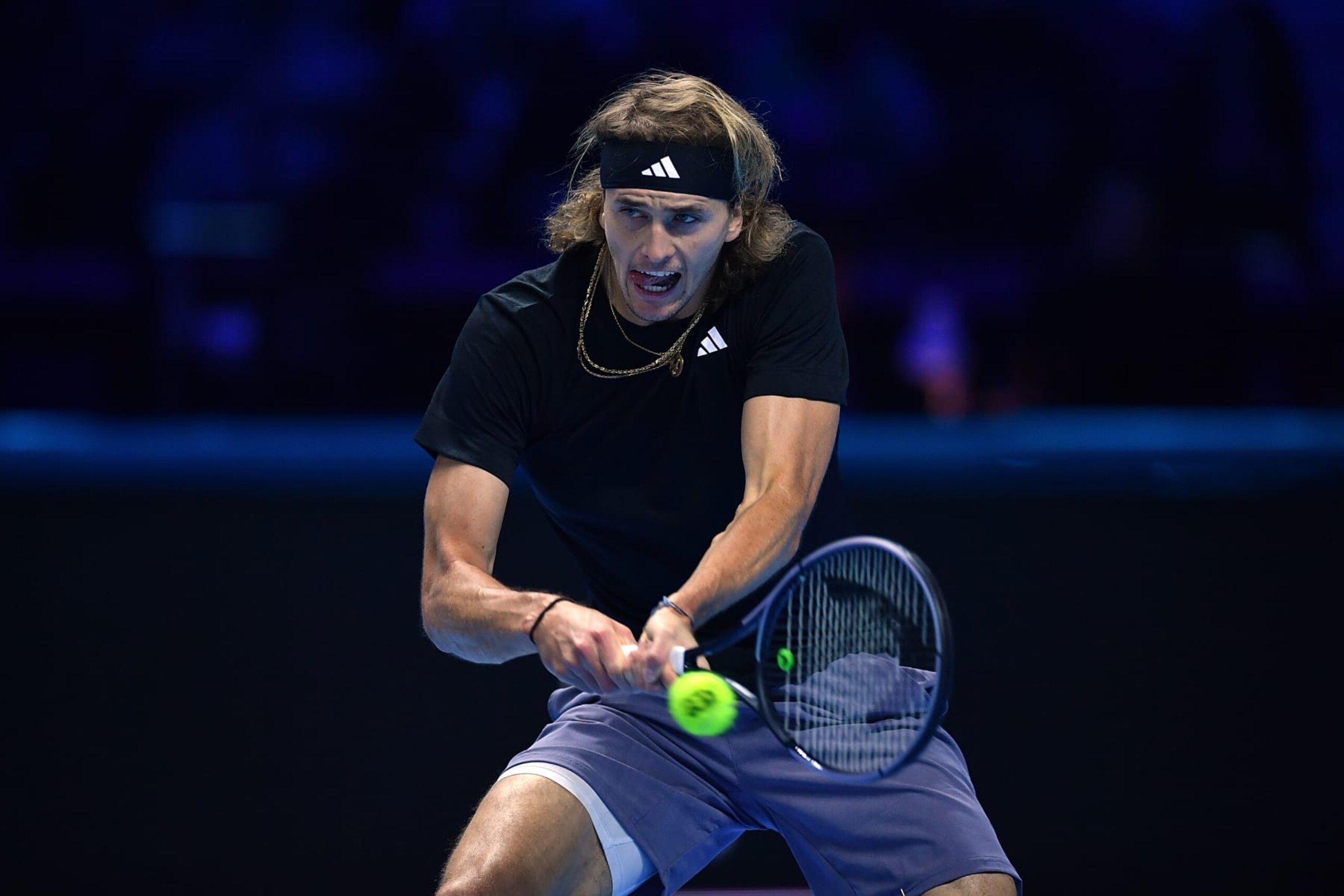TURIN, ITALY - NOVEMBER 15:  Alexander Zverev of Germany plays a backhand against Daniil Medvedev during the Men's Singles Round Robin match on day four of the Nitto ATP Finals at Pala Alpitour on November 15, 2023 in Turin, Italy.  (Photo by Valerio Pennicino/Getty Images)