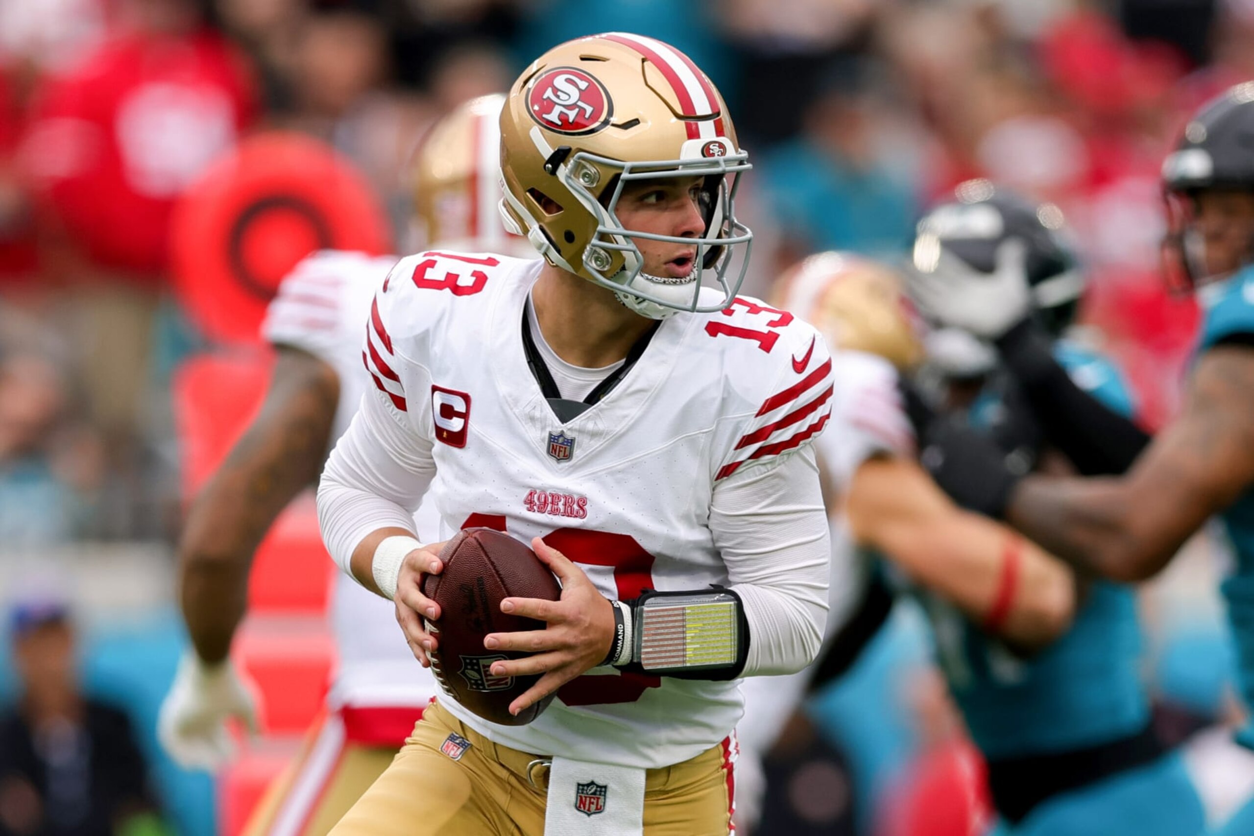 JACKSONVILLE, FLORIDA - NOVEMBER 12: Brock Purdy #13 of the San Francisco 49ers looks to pass against the Jacksonville Jaguars during the first half of the game at EverBank Stadium on November 12, 2023 in Jacksonville, Florida. (Photo by Megan Briggs/Getty Images)