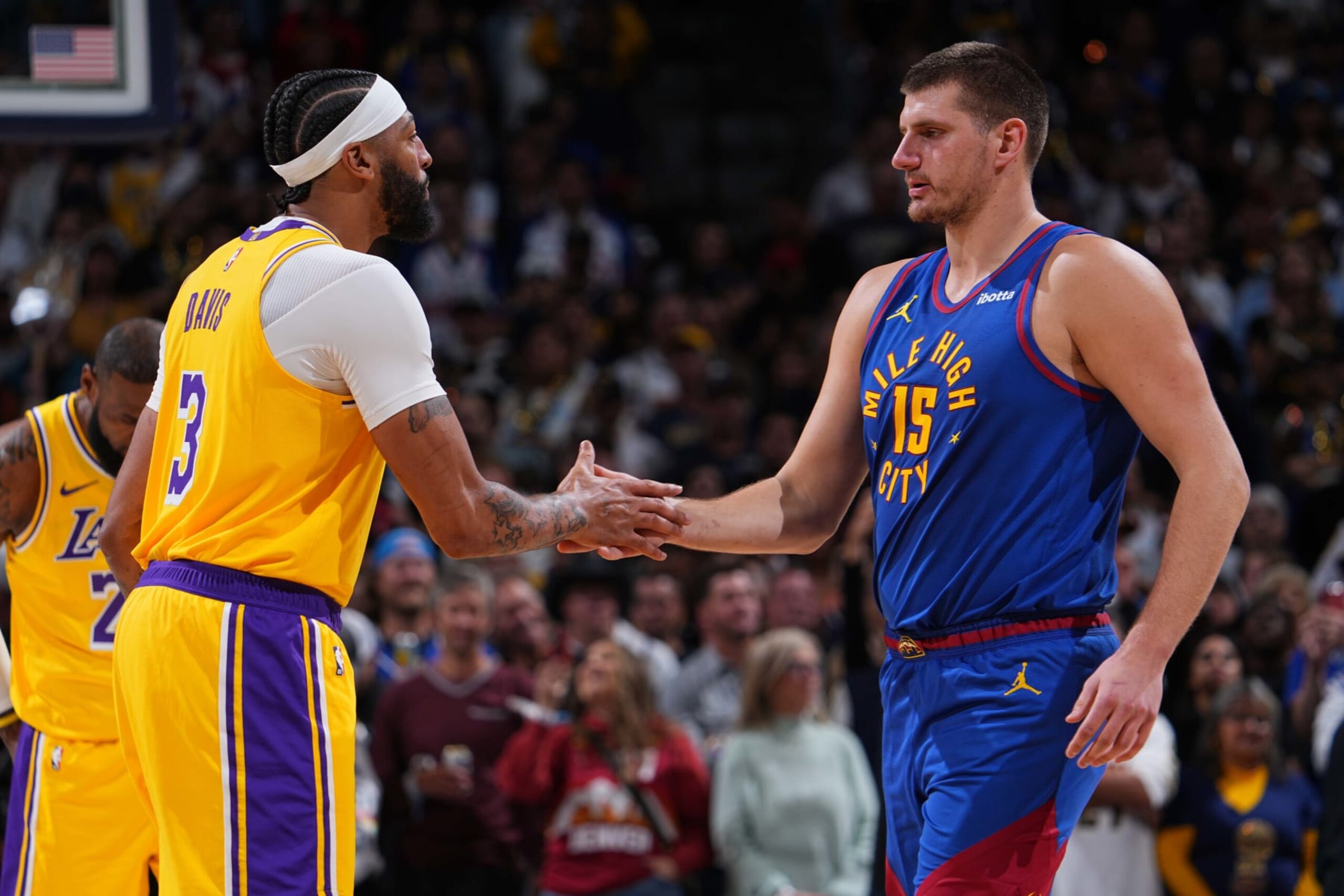 DENVER, CO - OCTOBER 24: Anthony Davis #3 of the Los Angeles Lakers and Nikola Jokic #15 of the Denver Nuggets shake hands before the game on October 24, 2023 at the Ball Arena in Denver, Colorado. NOTE TO USER: User expressly acknowledges and agrees that, by downloading and/or using this Photograph, user is consenting to the terms and conditions of the Getty Images License Agreement. Mandatory Copyright Notice: Copyright 2023 NBAE (Photo by Bart Young/NBAE via Getty Images)