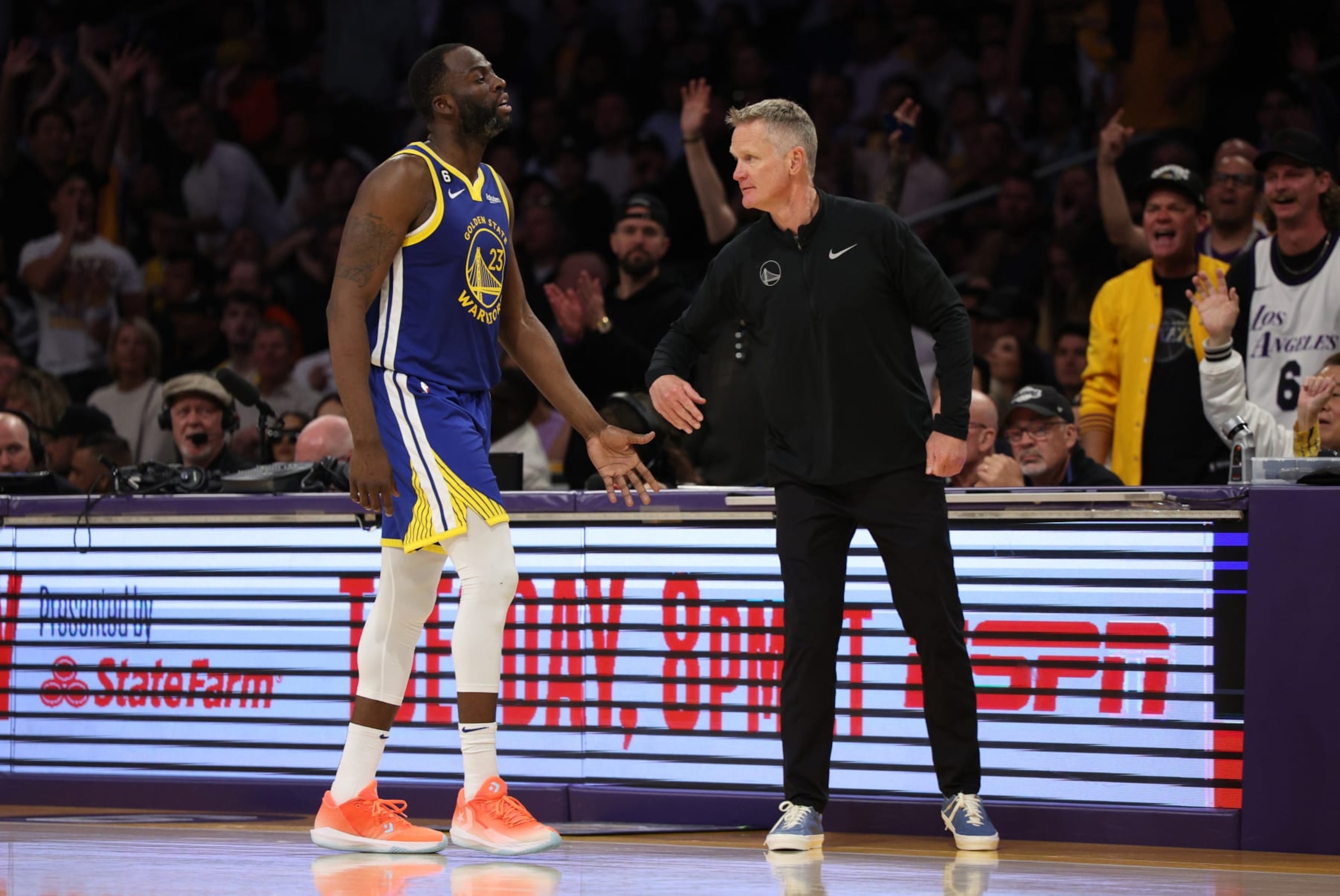 LOS ANGELES, CALIFORNIA - MAY 12: Draymond Green #23 of the Golden State Warriors high fives head coach Steve Kerr during the fourth quarter against the Los Angeles Lakers in game six of the Western Conference Semifinal Playoffs at Crypto.com Arena on May 12, 2023 in Los Angeles, California. NOTE TO USER: User expressly acknowledges and agrees that, by downloading and or using this photograph, User is consenting to the terms and conditions of the Getty Images License Agreement. (Photo by Harry How/Getty Images)