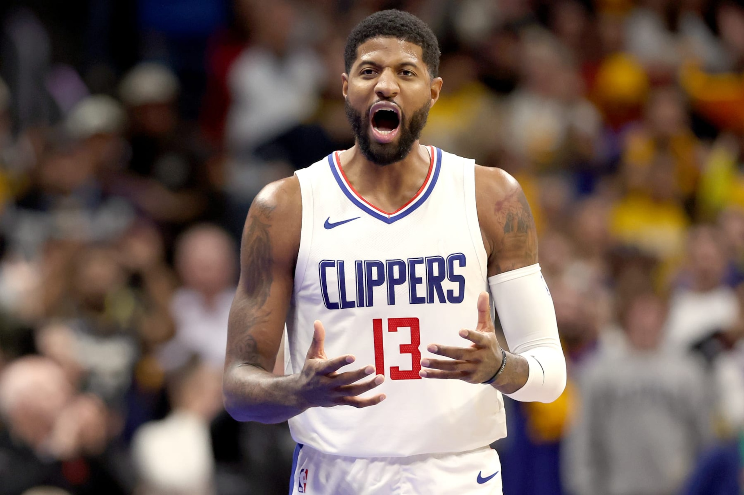 DENVER, COLORADO - NOVEMBER 14: Paul George #13 of the Los Angeles Clippers reacts against the Denver Nuggets in the fourth quarter at Ball Arena on November 14, 2023 in Denver, Colorado. NOTE TO USER: User expressly acknowledges and agrees that, by downloading and or using this photograph, User is consenting to the terms and conditions of the Getty Images License Agreement. (Photo by Matthew Stockman/Getty Images)