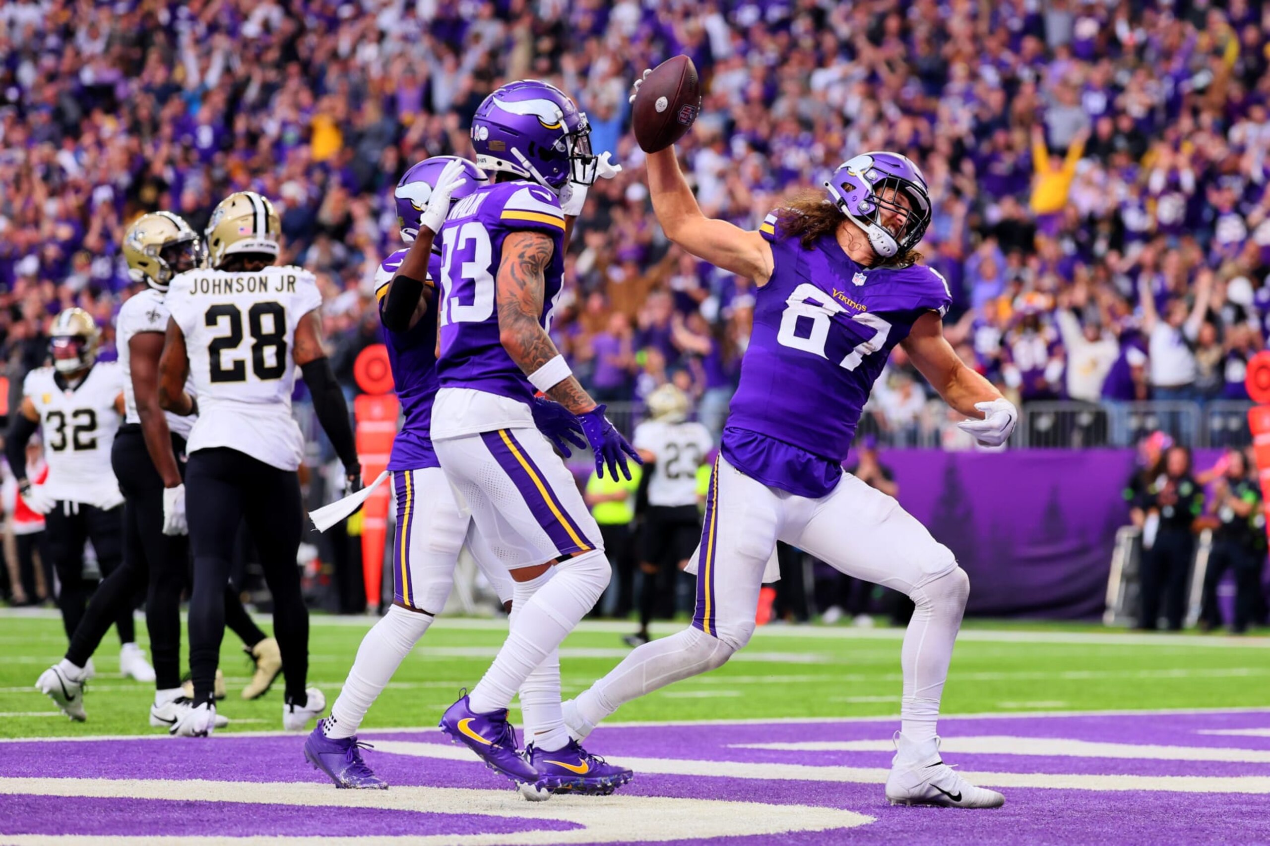 MINNEAPOLIS, MINNESOTA - NOVEMBER 12: T.J. Hockenson #87 of the Minnesota Vikings celebrates after scoring a touchdown against the New Orleans Saints during the second quarter at U.S. Bank Stadium on November 12, 2023 in Minneapolis, Minnesota. (Photo by Adam Bettcher/Getty Images)