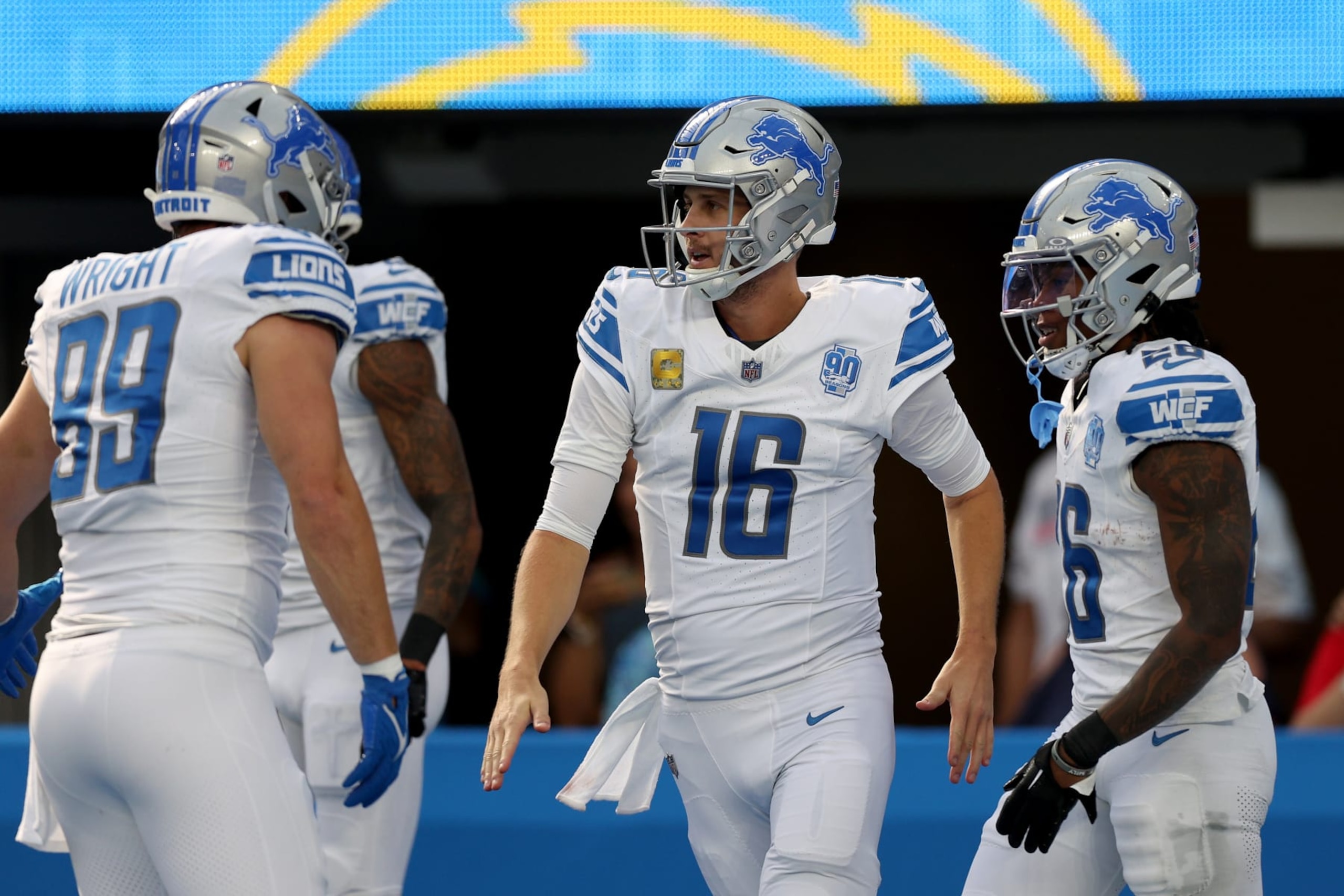 INGLEWOOD, CALIFORNIA - NOVEMBER 12: Jared Goff #16 of the Detroit Lions celebrates a run with Jahmyr Gibbs #26 of the Detroit Lions during the first quarter against the Los Angeles Chargers at SoFi Stadium on November 12, 2023 in Inglewood, California. (Photo by Harry How/Getty Images) INGLEWOOD, CALIFORNIA - NOVEMBER 12: Jared Goff #16 of the Detroit Lions celebrates a run with Jahmyr Gibbs #26 of the Detroit Lions during the first quarter against the Los Angeles Chargers at SoFi Stadium on November 12, 2023 in Inglewood, California. (Photo by Harry How/Getty Images)