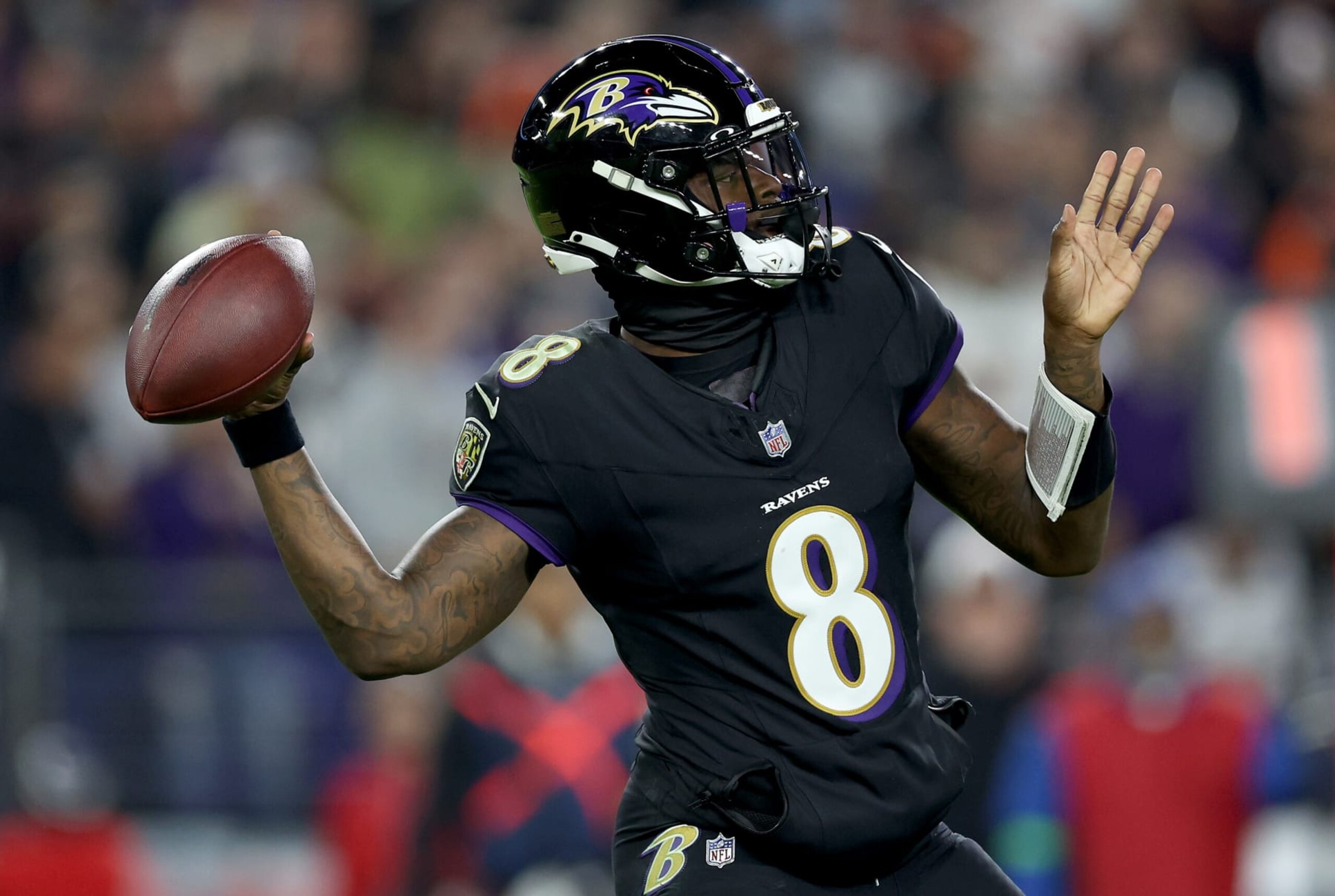 BALTIMORE, MARYLAND - NOVEMBER 16: Lamar Jackson #8 of the Baltimore Ravens throws a pass against the Cincinnati Bengals during the first quarter of the game at M&T Bank Stadium on November 16, 2023 in Baltimore, Maryland. (Photo by Patrick Smith/Getty Images)