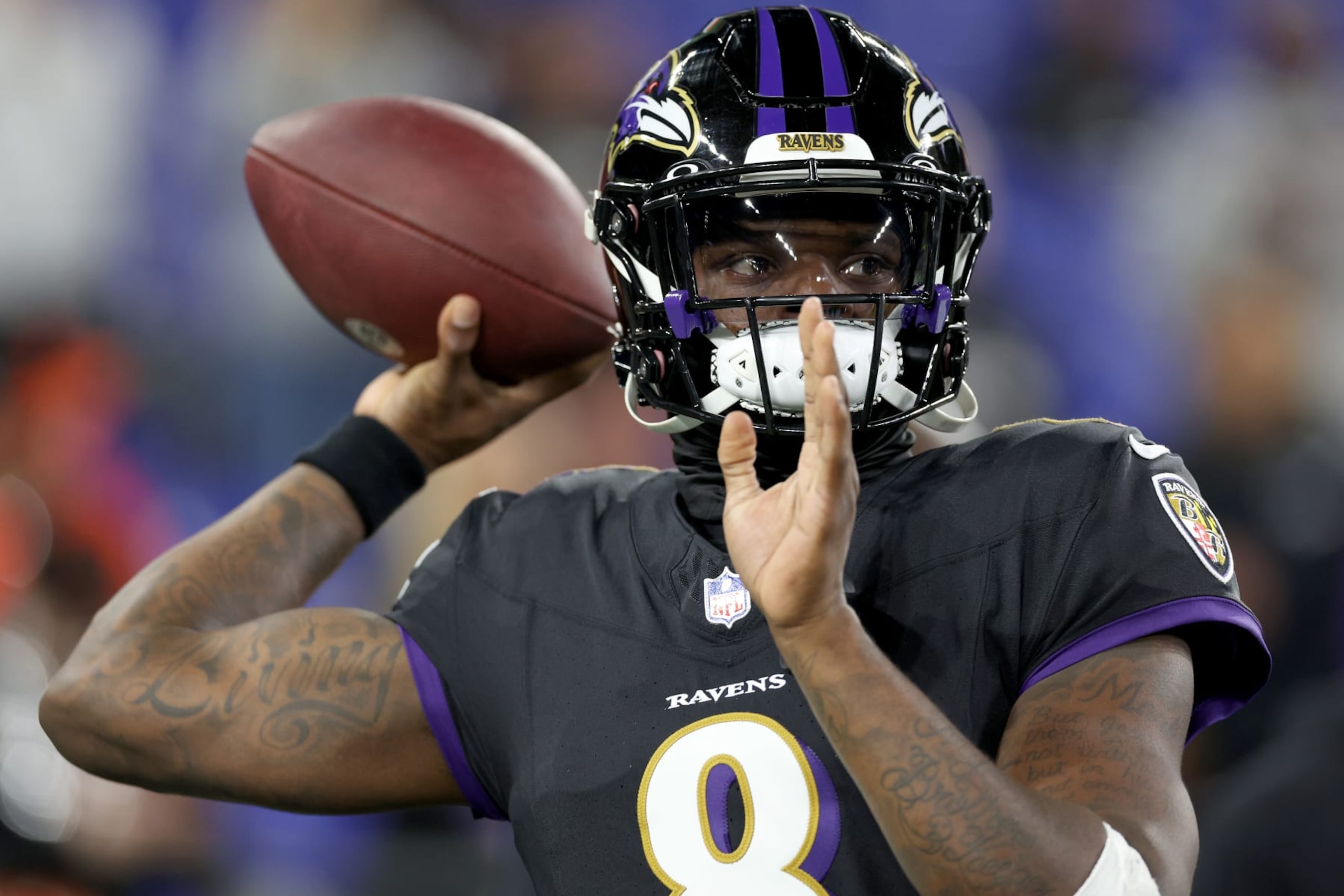 BALTIMORE, MARYLAND - NOVEMBER 16: Lamar Jackson #8 of the Baltimore Ravens warms up prior to the game against the Cincinnati Bengals at M&T Bank Stadium on November 16, 2023 in Baltimore, Maryland. (Photo by Patrick Smith/Getty Images)