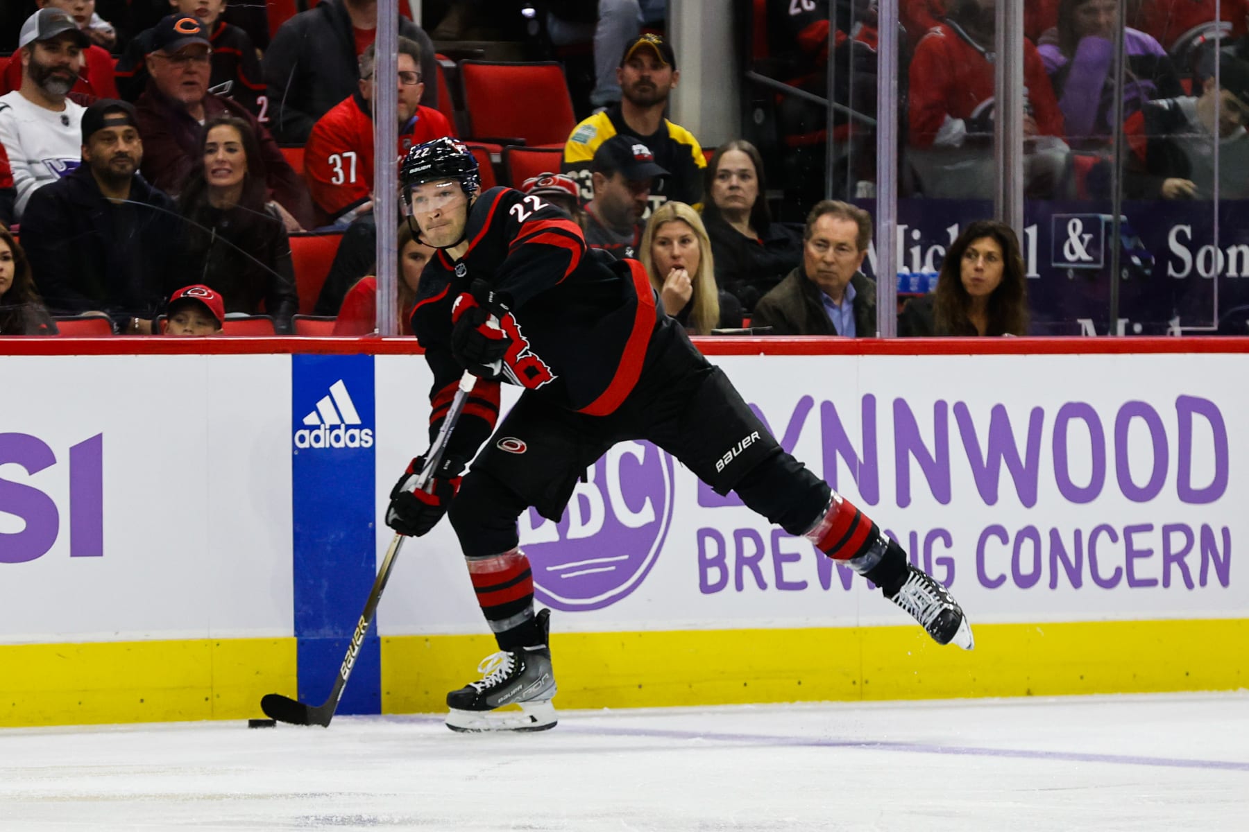 RALEIGH, NC - NOVEMBER 15: Brett Pesce #22 of the Carolina Hurricanes shoots the puck during the second period of the game against the Philadelphia Flyers at PNC Arena on November 15, 2023 in Raleigh, North Carolina. (Photo by Jaylynn Nash/Getty Images)