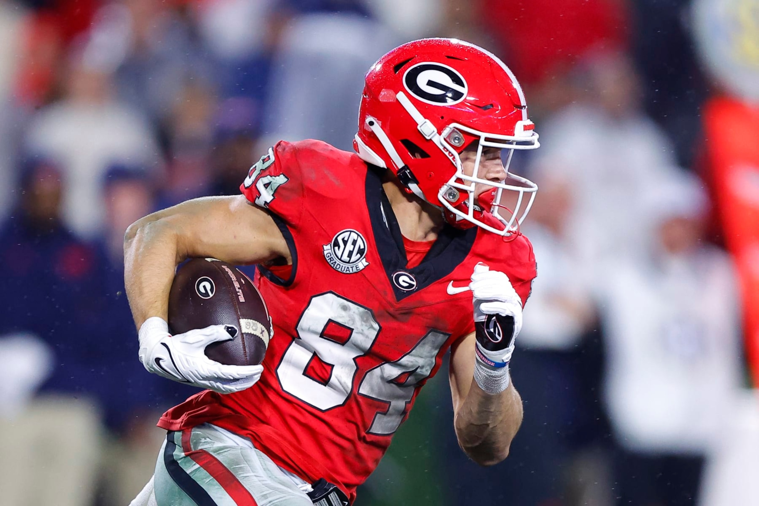 ATHENS, GEORGIA - NOVEMBER 11: Ladd McConkey #84 of the Georgia Bulldogs turns upfield during the second half against the Mississippi Rebels at Sanford Stadium on November 11, 2023 in Athens, Georgia. (Photo by Todd Kirkland/Getty Images)
