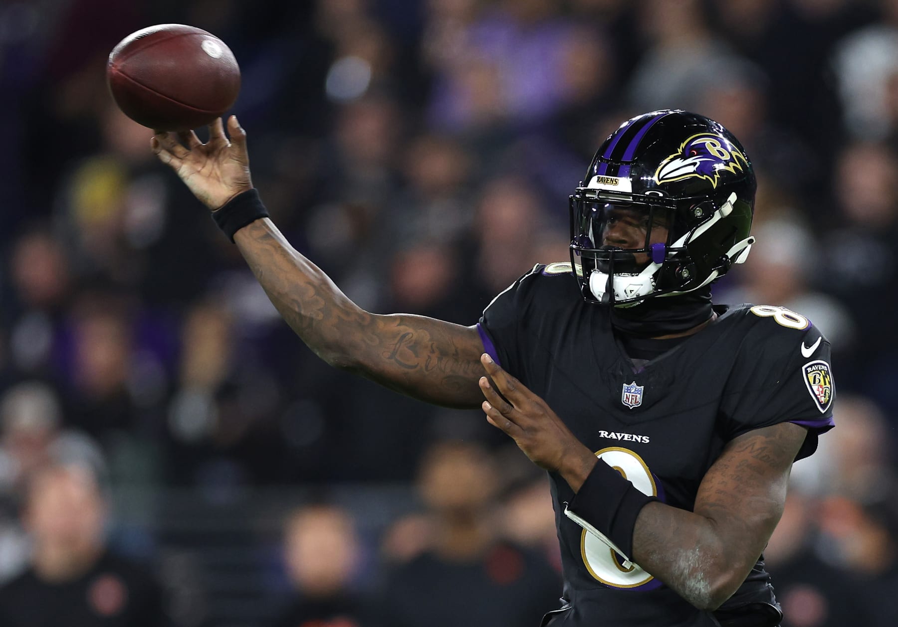 BALTIMORE, MARYLAND - NOVEMBER 16: Lamar Jackson #8 of the Baltimore Ravens throws a pass against the Cincinnati Bengals during the second quarter of the game at M&T Bank Stadium on November 16, 2023 in Baltimore, Maryland. (Photo by Patrick Smith/Getty Images)