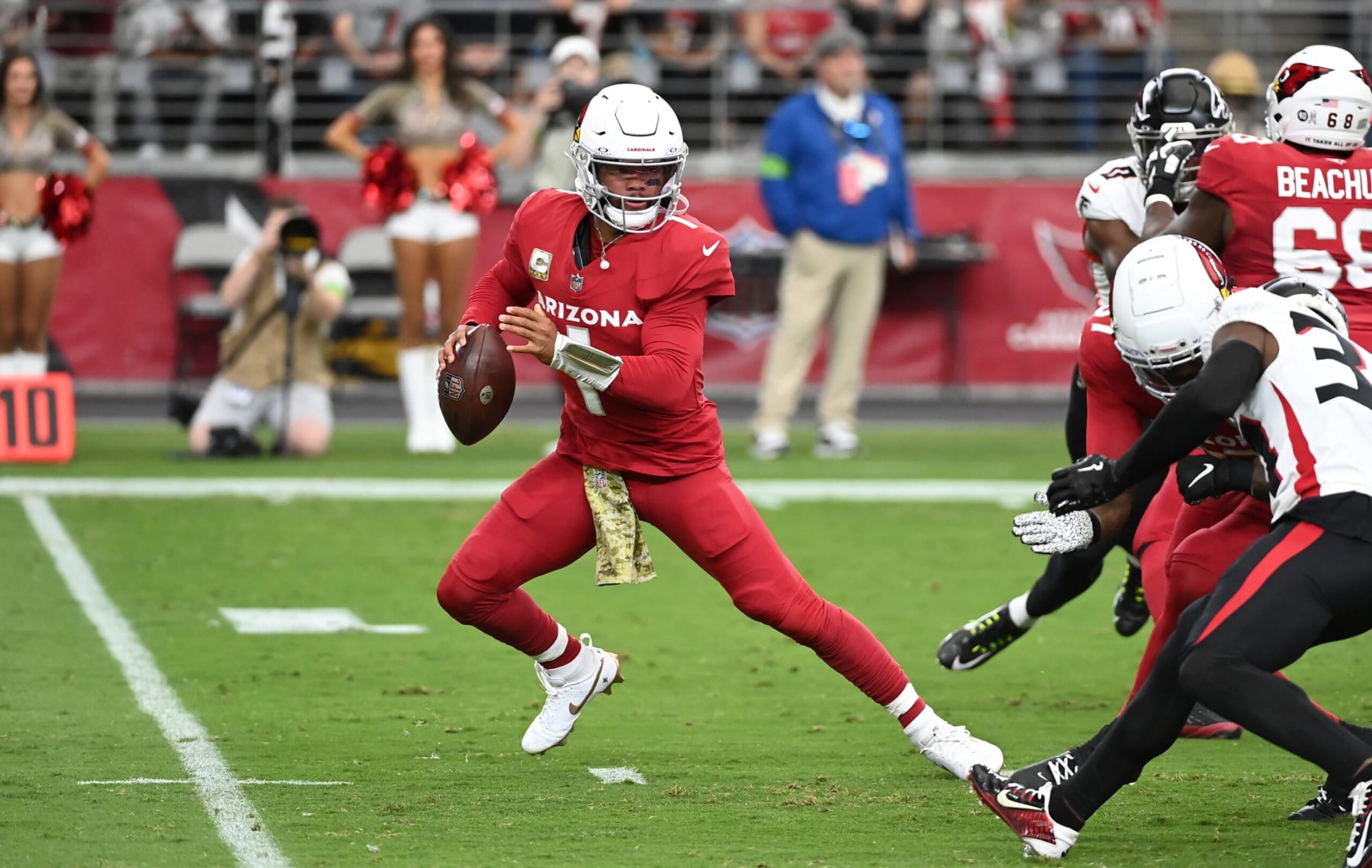 GLENDALE, ARIZONA - NOVEMBER 12: Kyler Murray #1 of the Arizona Cardinals runs out of the pocket against the Atlanta Falcons at State Farm Stadium on November 12, 2023 in Glendale, Arizona. (Photo by Norm Hall/Getty Images)
