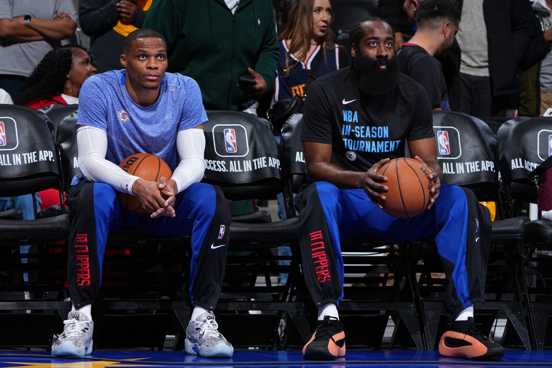 DENVER, CO - NOVEMBER 14: Russell Westbrook #0 of the LA Clippers and James Harden #1 of the LA Clippers look on before the game against the Denver Nuggets on November 14, 2023 at the Ball Arena in Denver, Colorado. NOTE TO USER: User expressly acknowledges and agrees that, by downloading and/or using this Photograph, user is consenting to the terms and conditions of the Getty Images License Agreement. Mandatory Copyright Notice: Copyright 2023 NBAE (Photo by Garrett Ellwood/NBAE via Getty Images)
