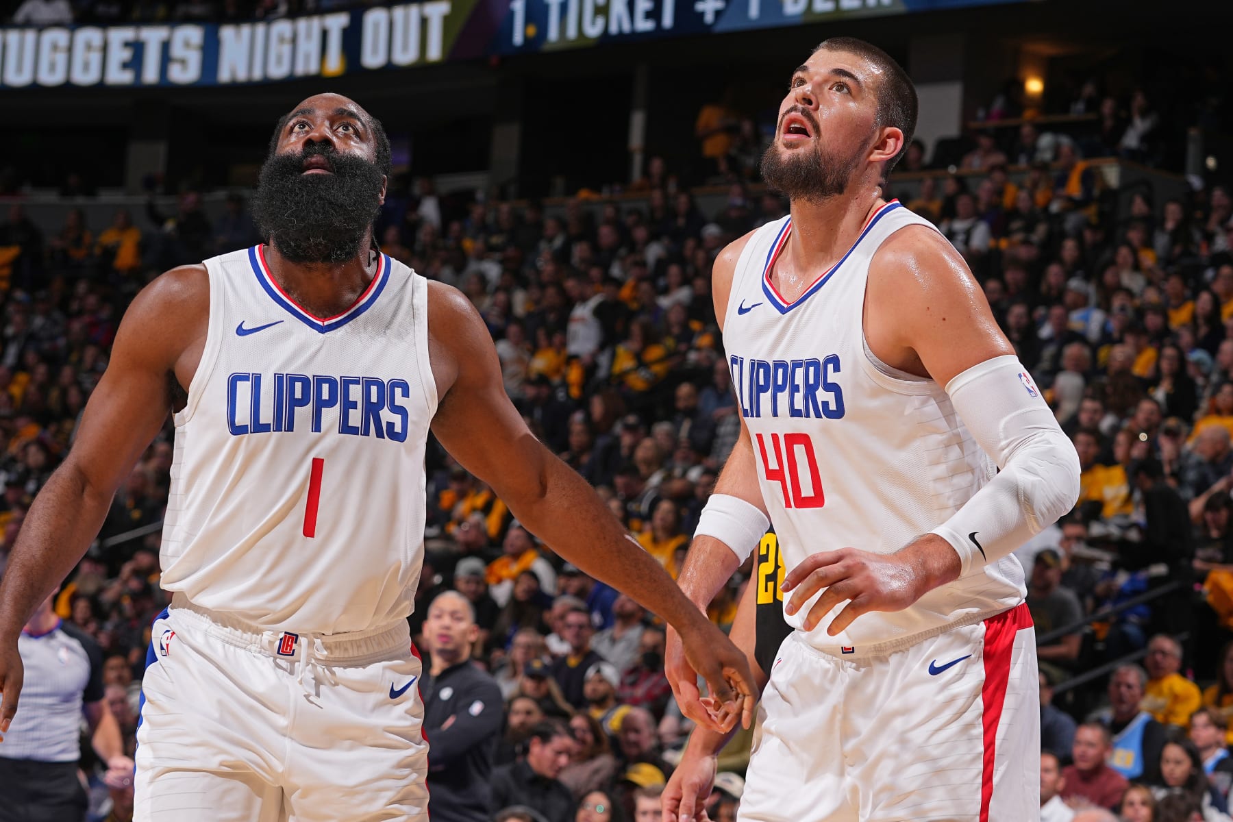 DENVER, CO - NOVEMBER 14: James Harden #1 and Ivica Zubac #40 of the LA Clippers look on during the game against the Denver Nuggets during the In-Season Tournament game on November 14, 2023 at the Ball Arena in Denver, Colorado. NOTE TO USER: User expressly acknowledges and agrees that, by downloading and/or using this Photograph, user is consenting to the terms and conditions of the Getty Images License Agreement. Mandatory Copyright Notice: Copyright 2023 NBAE (Photo by Bart Young/NBAE via Getty Images)