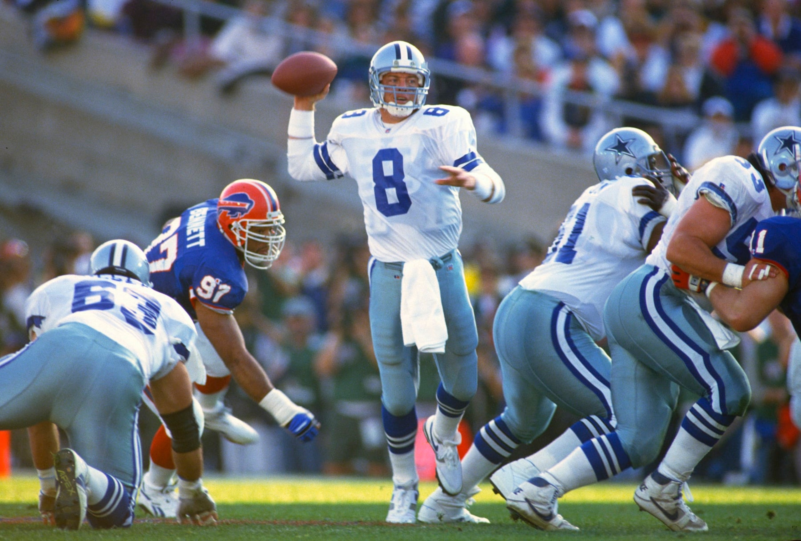 PASADENA, CA - JANUARY 31: Troy Aikman #8 of the Dallas Cowboys drops back to pass against the Buffalo Bills during Super Bowl XXVII on January 31, 1993 at The Rose Bowl in Pasadena, California. The Cowboys won the Super Bowl 52-17. (Photo by Focus on Sport/Getty Images) 