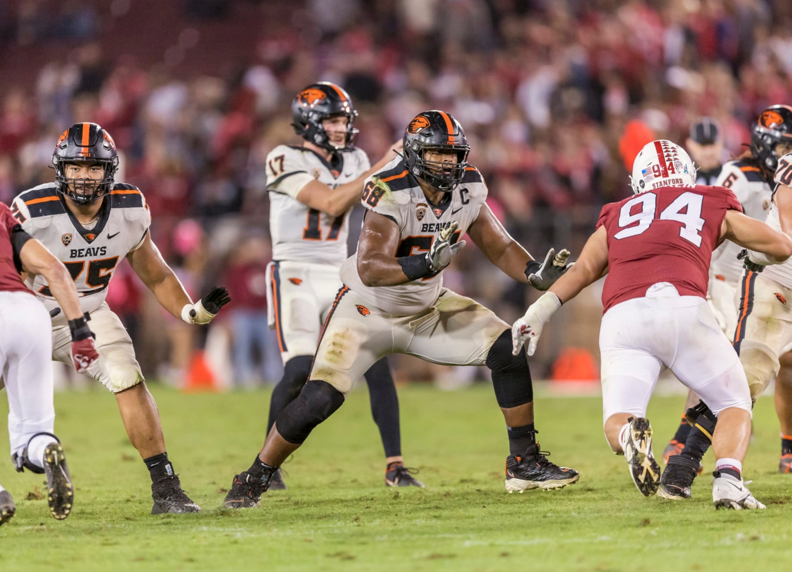PALO ALTO, CA - OCTOBER 8:  Brandon Kipper #68 and Taliese Fuaga #75 of the Oregon State Beavers block for quarterback Ben Gulbranson #17 during a Pac-12 NCAA football game against the Stanford Cardinal  played on October 8, 2022 at Stanford Stadium in Palo Alto, California.  (Photo by David Madison/Getty Images)