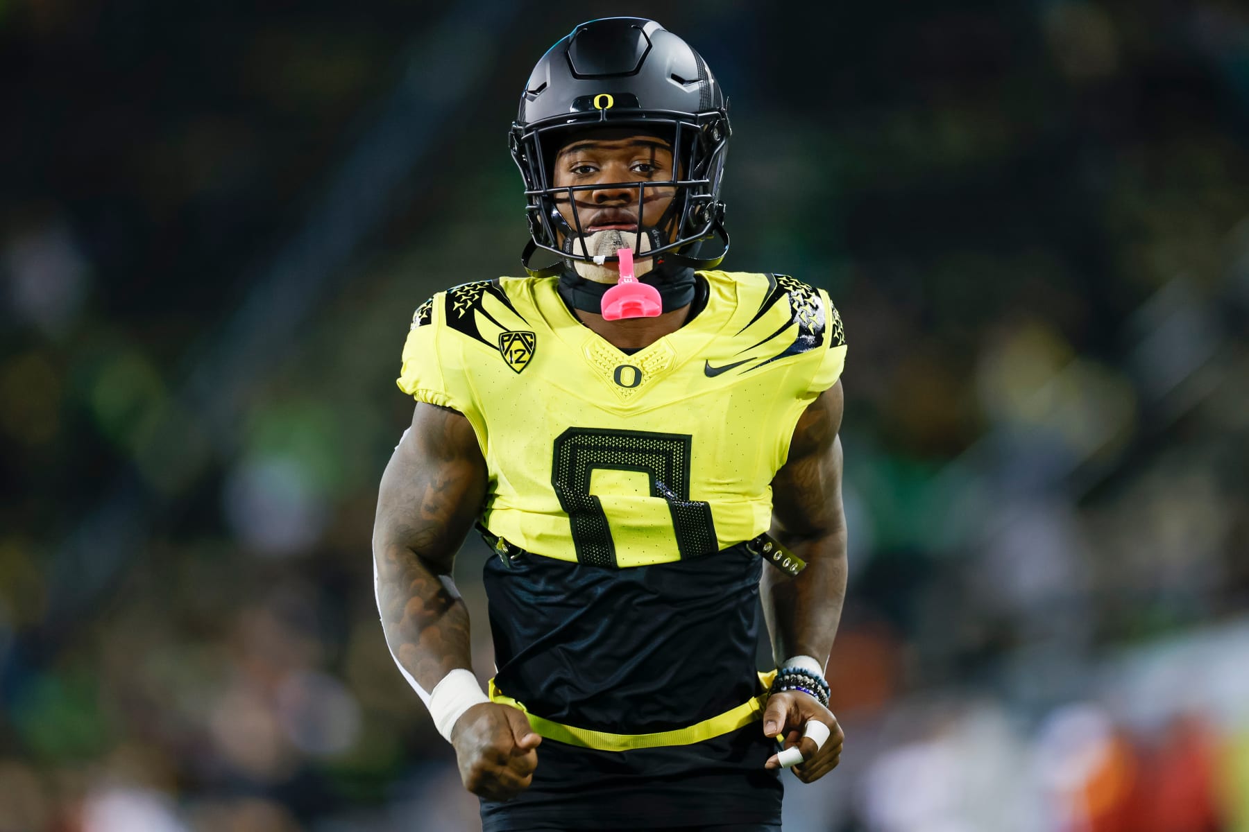 EUGENE, OREGON - NOVEMBER 11: Bucky Irving #0 of the Oregon Ducks warms up prior to a game against the USC Trojans at Autzen Stadium on November 11, 2023 in Eugene, Oregon. (Photo by Brandon Sloter/Image Of Sport/Getty Images)