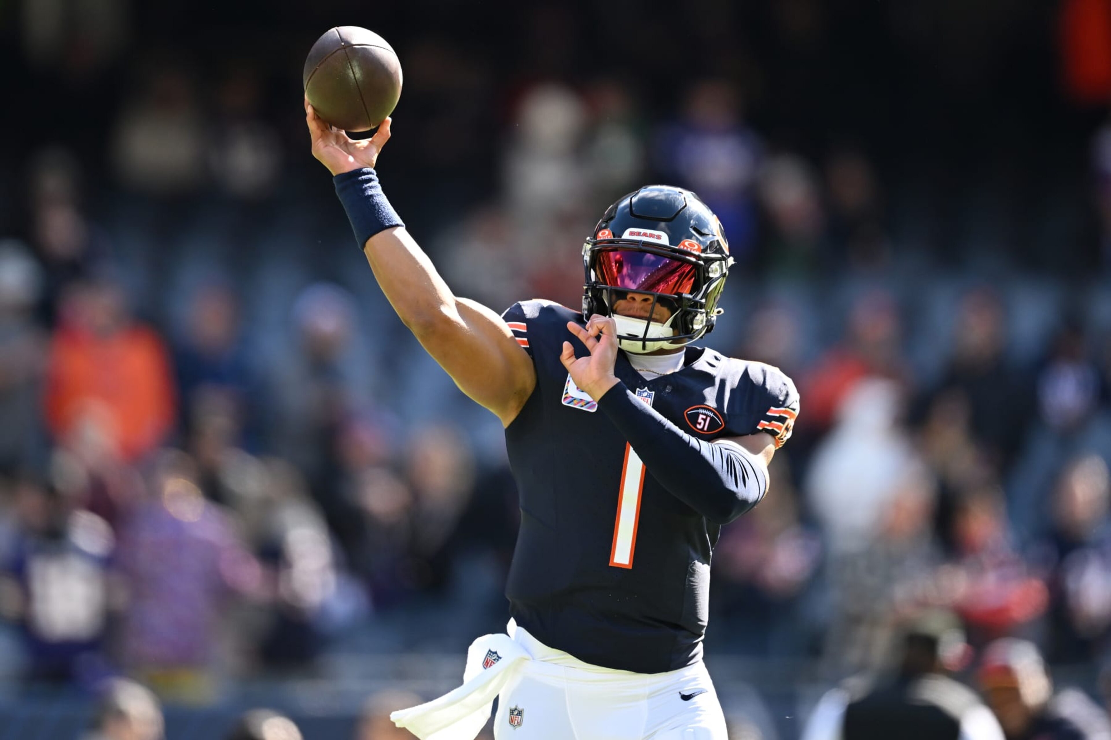 CHICAGO, ILLINOIS - OCTOBER 15: Justin Fields #1 of the Chicago Bears warms up before the game against the Minnesota Vikings at Soldier Field on October 15, 2023 in Chicago, Illinois. (Photo by Quinn Harris/Getty Images) CHICAGO, ILLINOIS - OCTOBER 15: Justin Fields #1 of the Chicago Bears warms up before the game against the Minnesota Vikings at Soldier Field on October 15, 2023 in Chicago, Illinois. (Photo by Quinn Harris/Getty Images)