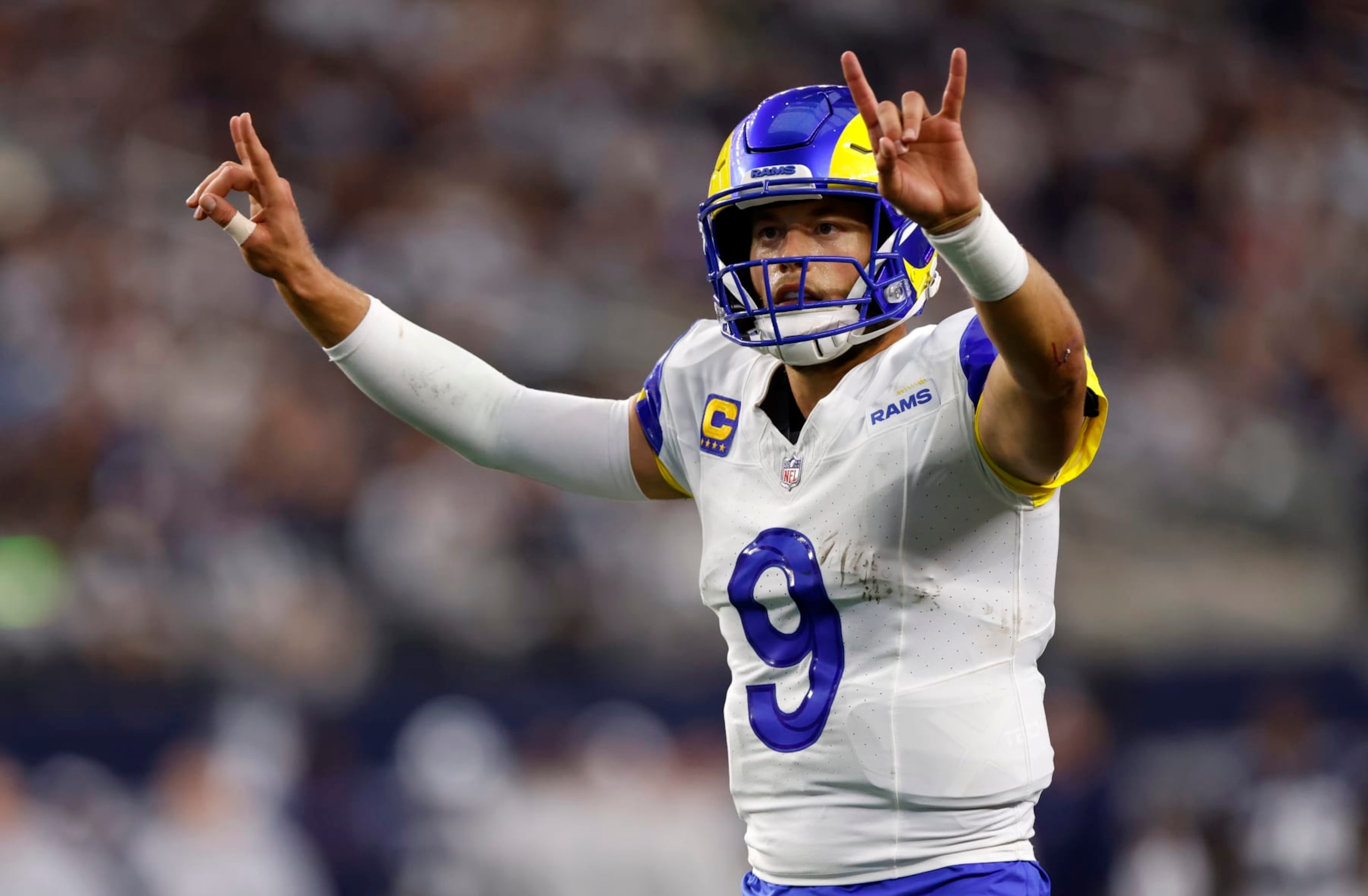 ARLINGTON, TX - OCTOBER 29: Matthew Stafford #9 of the Los Angeles Rams signals for a two point conversion against the Dallas Cowboys at AT&T Stadium on October 29, 2023 in Arlington, Texas. (Photo by Ron Jenkins/Getty Images) ARLINGTON, TX - OCTOBER 29: Matthew Stafford #9 of the Los Angeles Rams signals for a two point conversion against the Dallas Cowboys at AT&T Stadium on October 29, 2023 in Arlington, Texas. (Photo by Ron Jenkins/Getty Images)