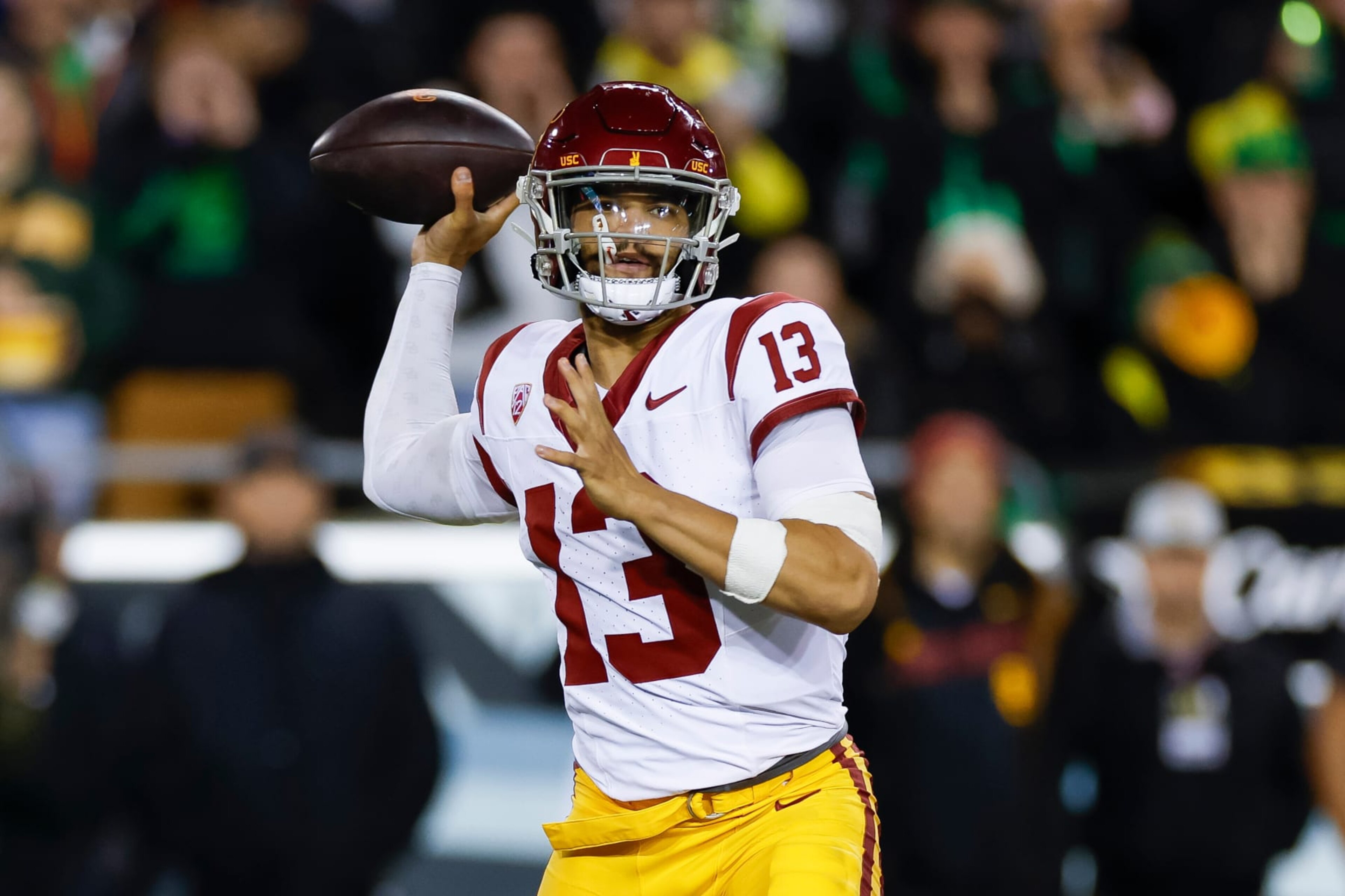EUGENE, OREGON - NOVEMBER 11: Caleb Williams #13 of the USC Trojans passes the ball in the second half during a game against the Oregon Ducks at Autzen Stadium on November 11, 2023 in Eugene, Oregon. (Photo by Brandon Sloter/Image Of Sport/Getty Images) EUGENE, OREGON - NOVEMBER 11: Caleb Williams #13 of the USC Trojans passes the ball in the second half during a game against the Oregon Ducks at Autzen Stadium on November 11, 2023 in Eugene, Oregon. (Photo by Brandon Sloter/Image Of Sport/Getty Images)