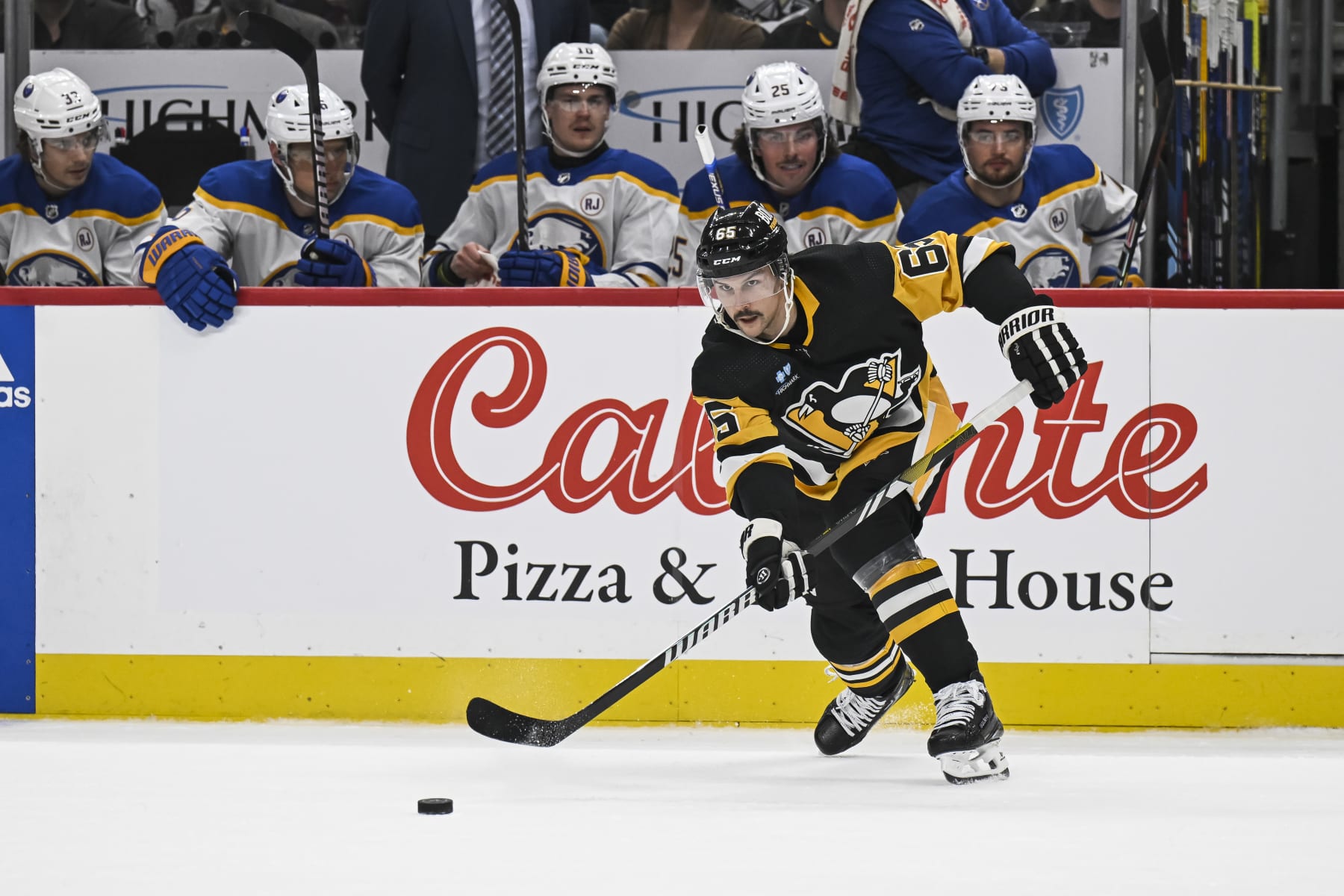 PITTSBURGH, PA - NOVEMBER 11: Pittsburgh Penguins defenseman Erik Karlsson (65) passes the puck during the first period in the NHL game between the Pittsburgh Penguins and the Buffalo Sabres on November 11, 2023, at PPG Paints Arena in Pittsburgh, PA. (Photo by Jeanine Leech/Icon Sportswire via Getty Images)