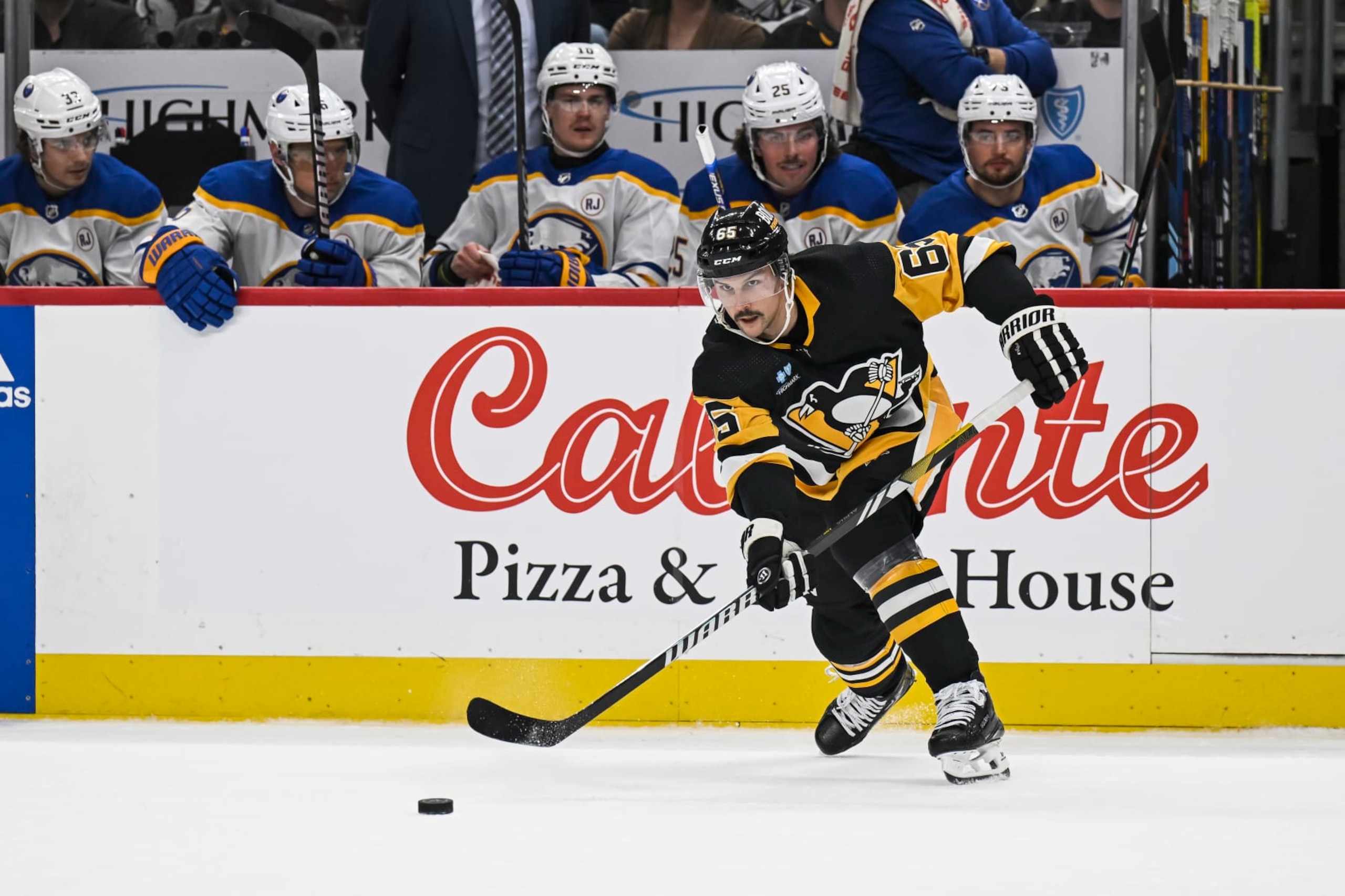 PITTSBURGH, PA - NOVEMBER 11: Pittsburgh Penguins defenseman Erik Karlsson (65) passes the puck during the first period in the NHL game between the Pittsburgh Penguins and the Buffalo Sabres on November 11, 2023, at PPG Paints Arena in Pittsburgh, PA. (Photo by Jeanine Leech/Icon Sportswire via Getty Images)