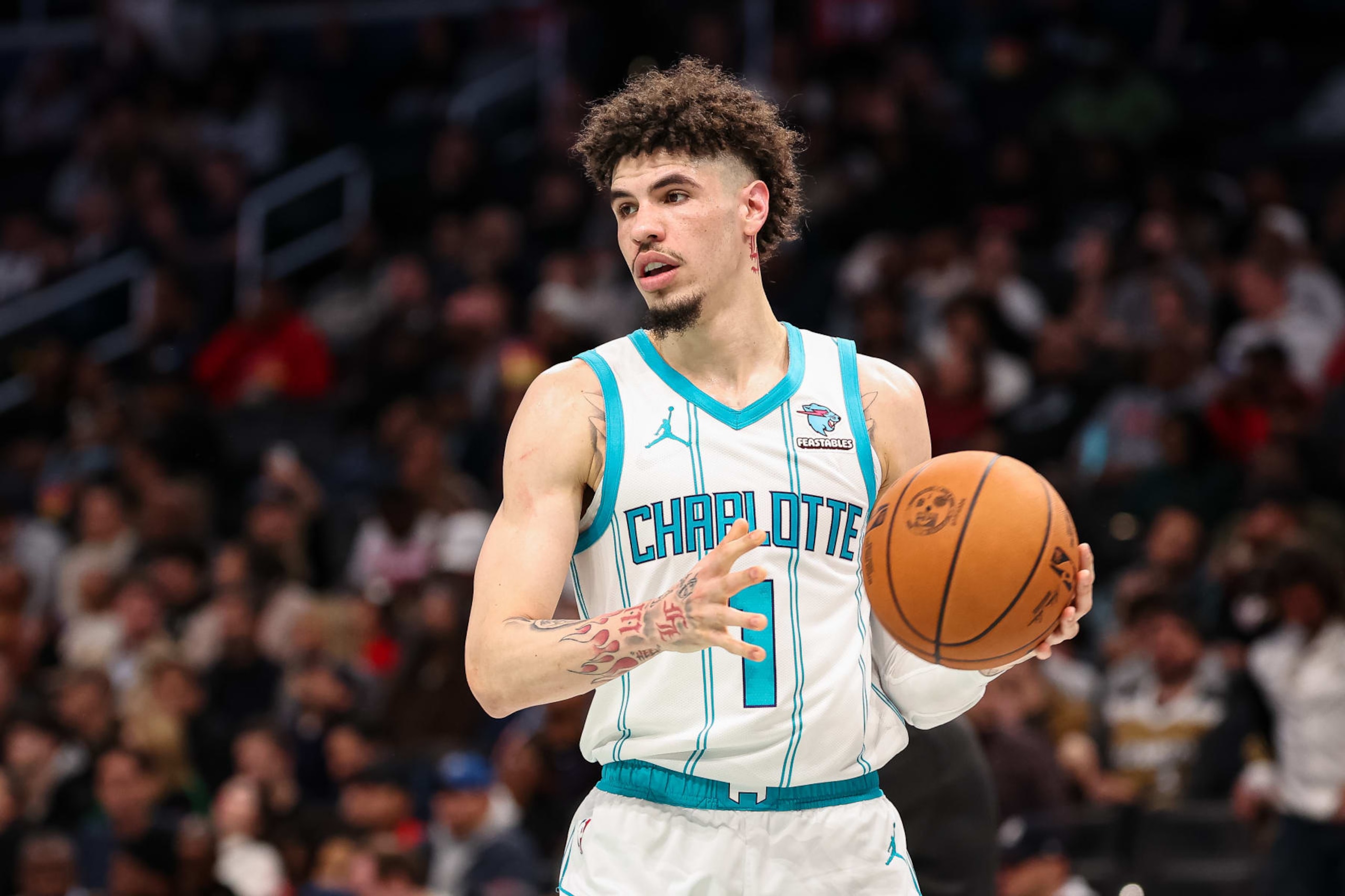 WASHINGTON, DC - NOVEMBER 10: LaMelo Ball #1 of the Charlotte Hornets handles the ball against the Washington Wizards during the first half at Capital One Arena on November 10, 2023 in Washington, DC. NOTE TO USER: User expressly acknowledges and agrees that, by downloading and or using this photograph, User is consenting to the terms and conditions of the Getty Images License Agreement. (Photo by Scott Taetsch/Getty Images)