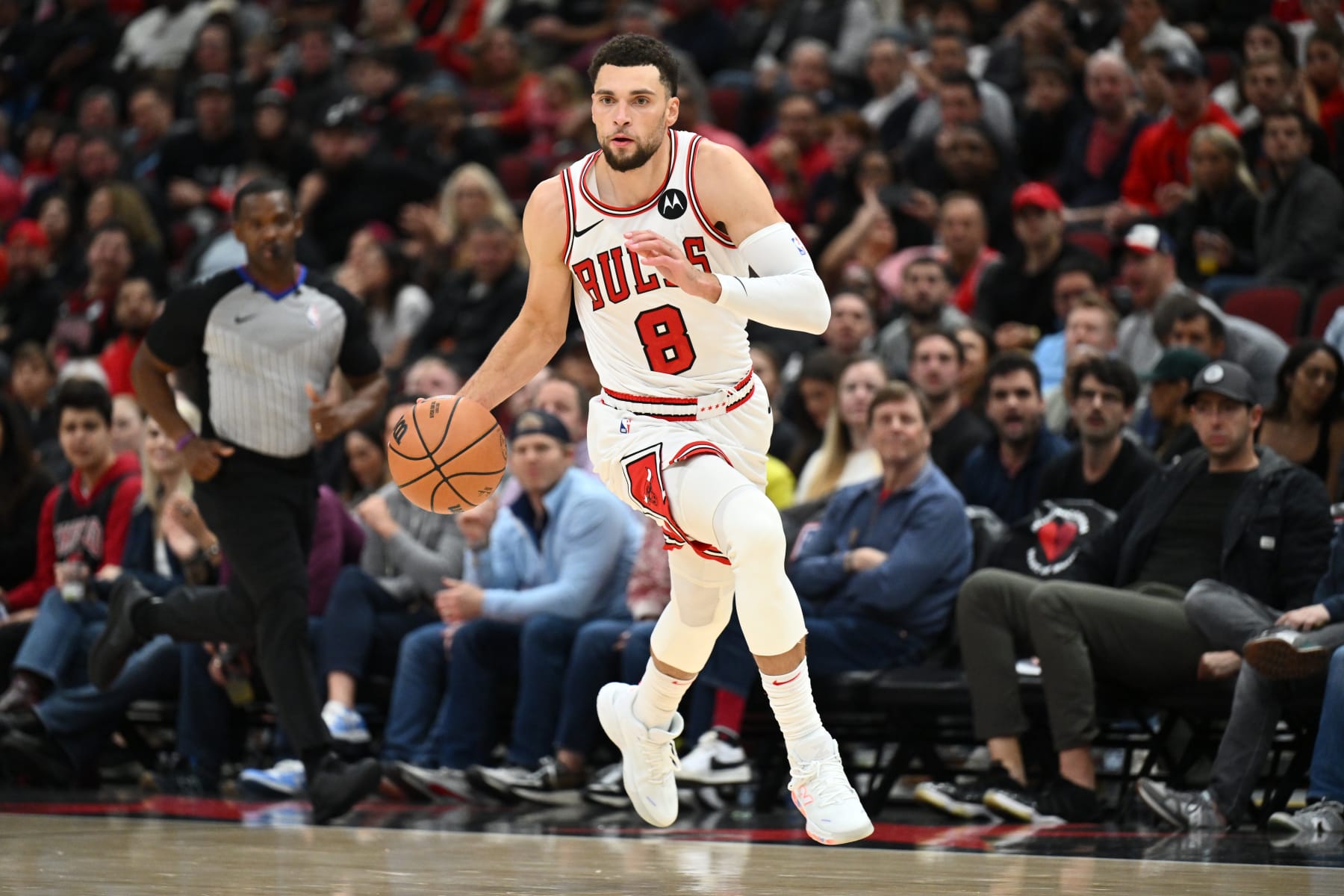 CHICAGO, ILLINOIS - NOVEMBER 15: Zach Lavine #8 of the Chicago Bulls brings the ball up court in the second half against the Orlando Magic at United Center on November 15, 2023 in Chicago, Illinois. Orlando defeated Chicago 96-94. NOTE TO USER: User expressly acknowledges and agrees that, by downloading and or using this photograph, User is consenting to the terms and conditions of the Getty Images License Agreement. (Photo by Jamie Sabau/Getty Images)