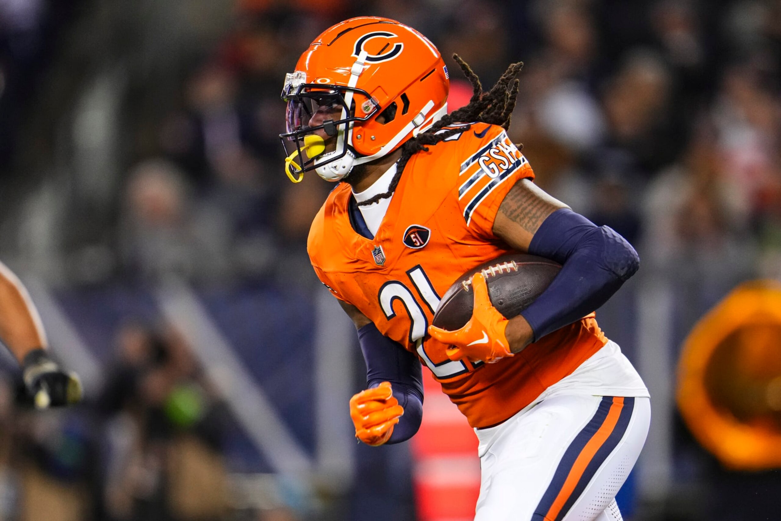 CHICAGO, IL - NOVEMBER 09: D'Onta Foreman #21 of the Chicago Bears runs the ball during an NFL football game against the Carolina Panthers at Soldier Field on November 9, 2023 in Chicago, Illinois. (Photo by Cooper Neill/Getty Images)