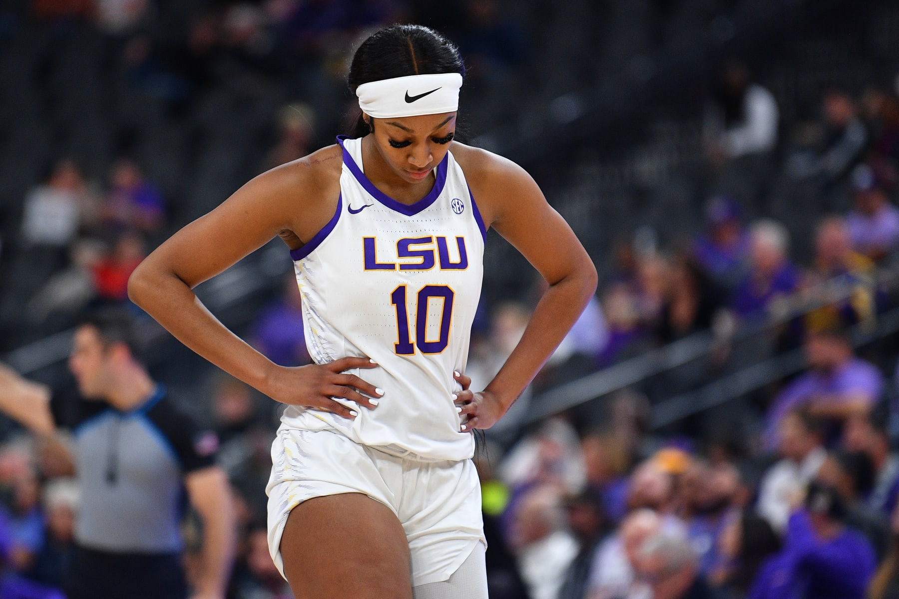 LAS VEGAS, NV - NOVEMBER 06: LSU Tigers forward Angel Reese (10) looks on during the Hall of Fame Series, a women's college basketball game between the LSU Tigers and the Colorado Buffaloes on November 6, 2023 at T-Mobile Arena in Las Vegas, NV. (Photo by Brian Rothmuller/Icon Sportswire via Getty Images) LAS VEGAS, NV - NOVEMBER 06: LSU Tigers forward Angel Reese (10) looks on during the Hall of Fame Series, a women's college basketball game between the LSU Tigers and the Colorado Buffaloes on November 6, 2023 at T-Mobile Arena in Las Vegas, NV. (Photo by Brian Rothmuller/Icon Sportswire via Getty Images)